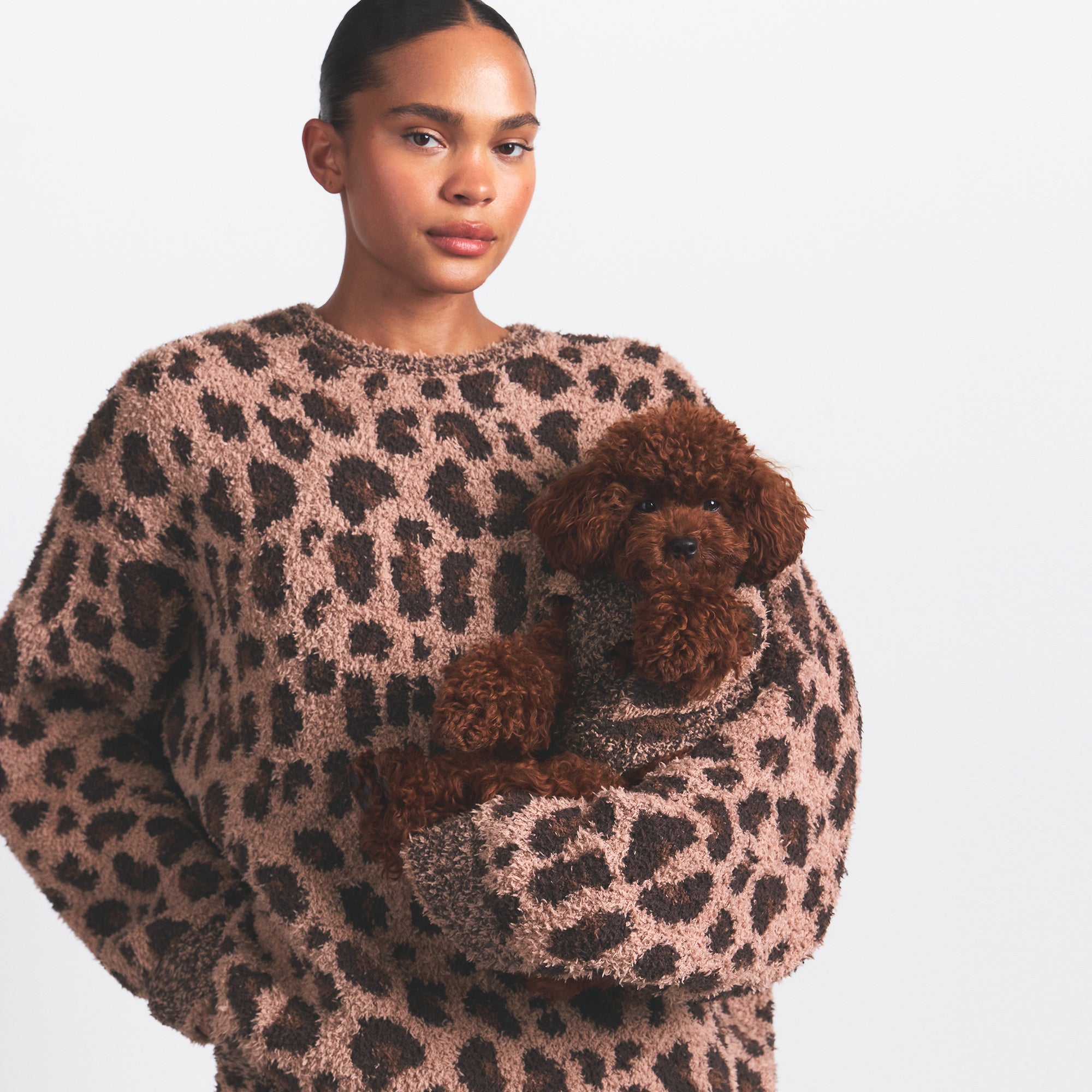 COZY OVERSIZED CREWNECK PULLOVER | SIENNA LEOPARD PRINT ON A MODEL SIDE VIEW @ | FOCUS: 0.0, 1.0, 0.9