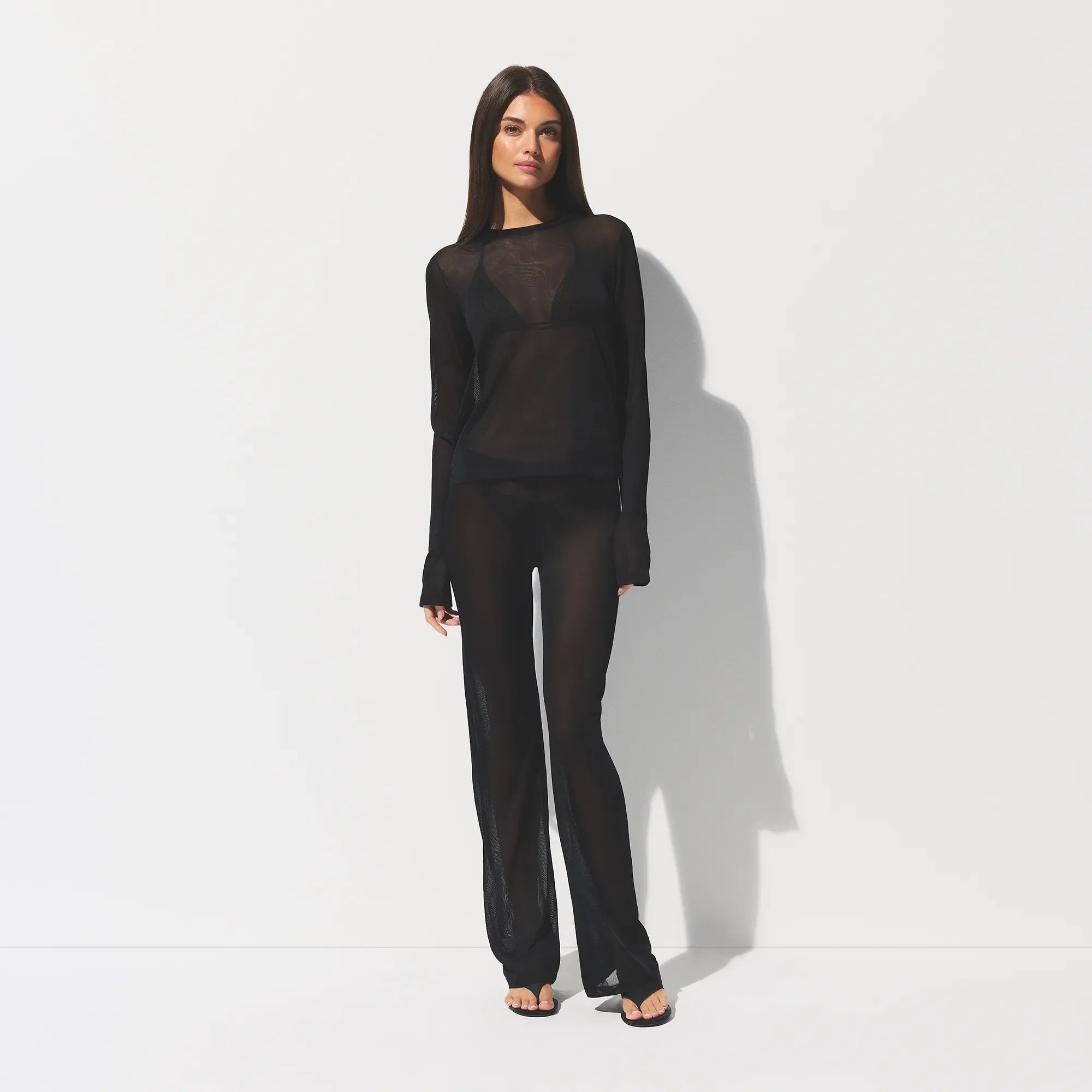 SLINKY KNIT CREW NECK LONG SLEEVE TOP | OBSIDIAN ON A MODEL FRONT VIEW @ | FOCUS: 0.0, 1.0, 0.9