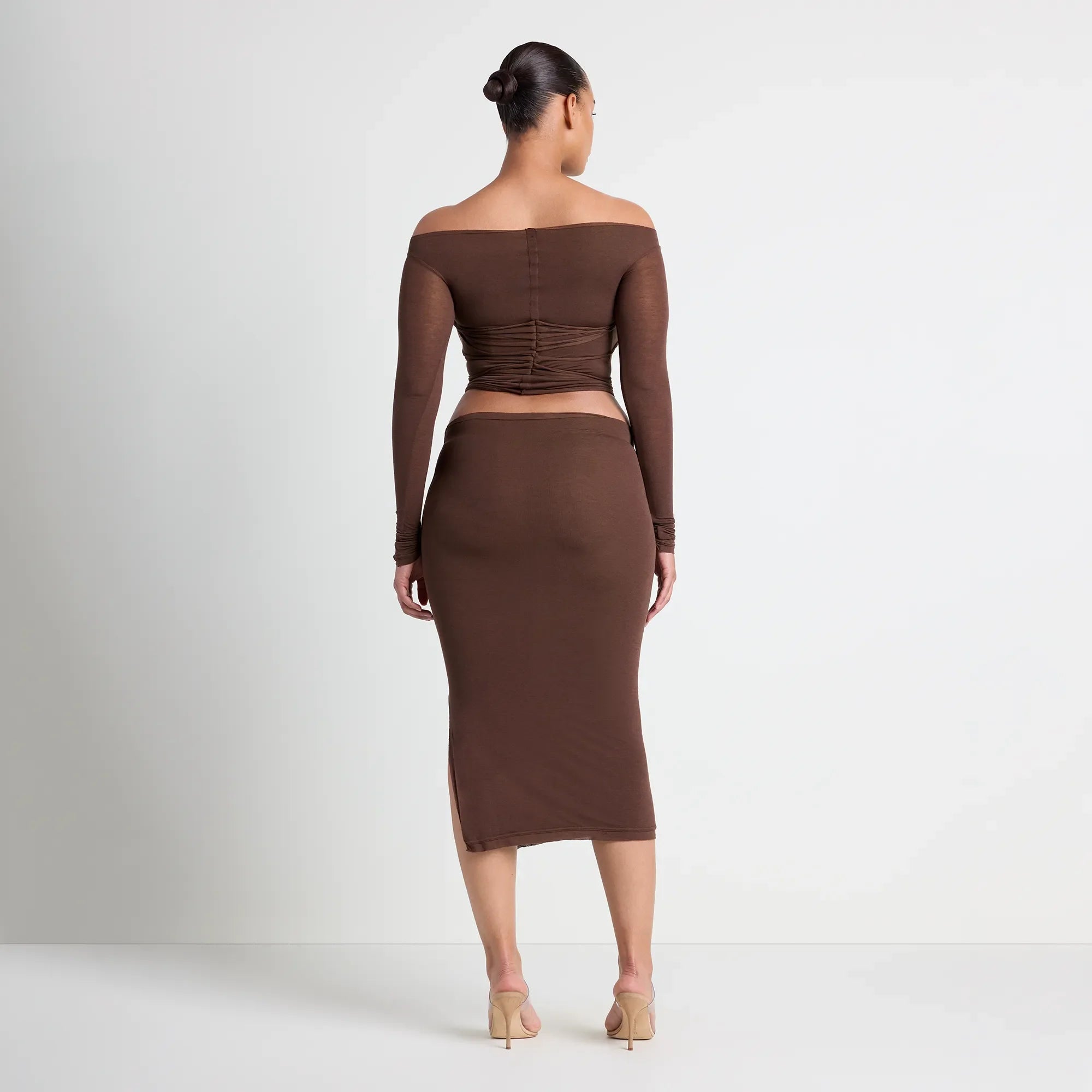 VETTESE X SKIMS SHEER MODAL OFF THE SHOULDER TOP | COCOA ON A MODEL BACK VIEW | FOCUS: 0.0, 1.0, 0.9