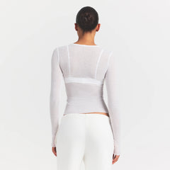 SHEER RIB LONG SLEEVE | SNOW ON A MODEL SIDE VIEW @ | FOCUS: 0.0, 1.0, 0.9