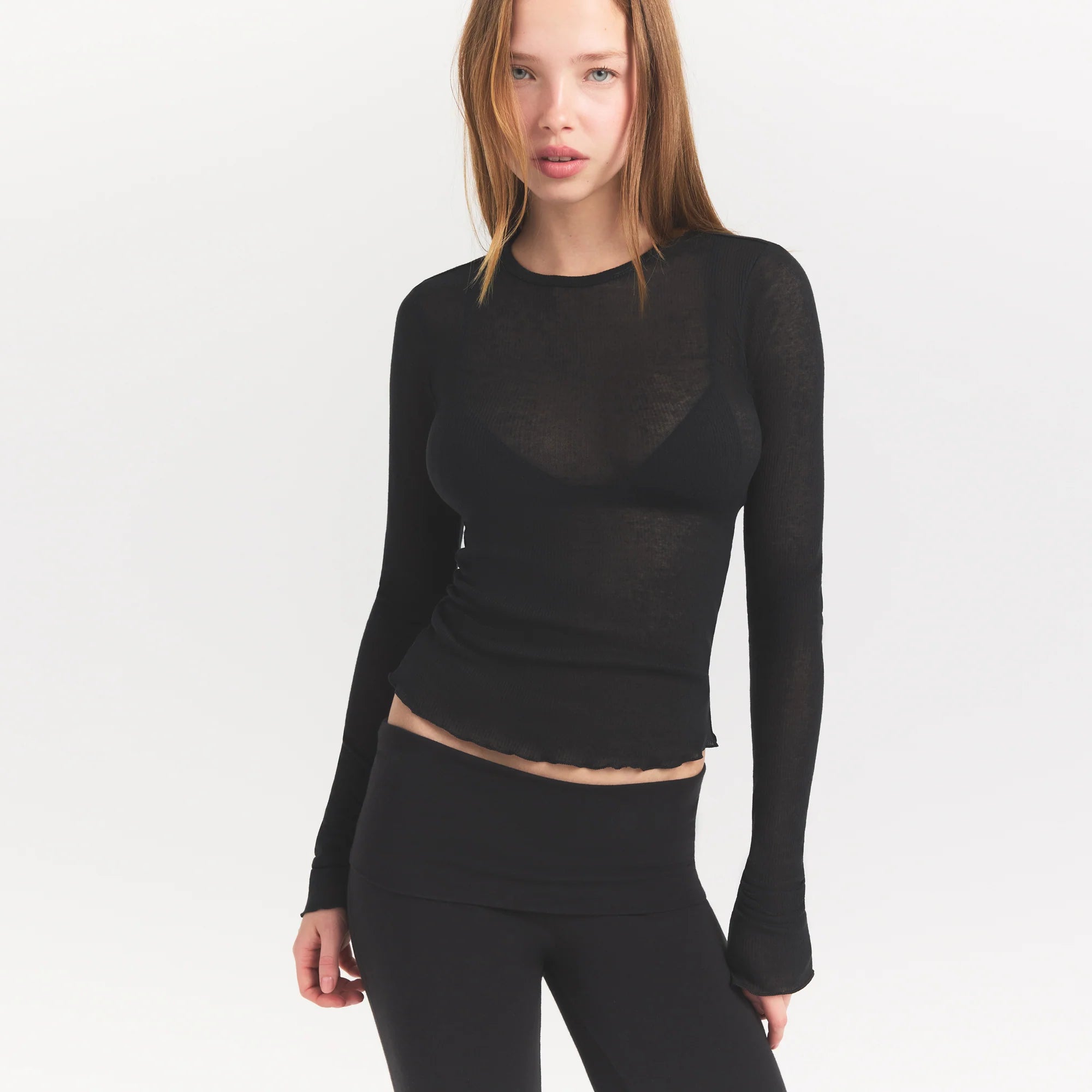 SHEER RIB LONG SLEEVE | SOOT ON A MODEL SIDE VIEW @ | FOCUS: 0.0, 1.0, 0.9