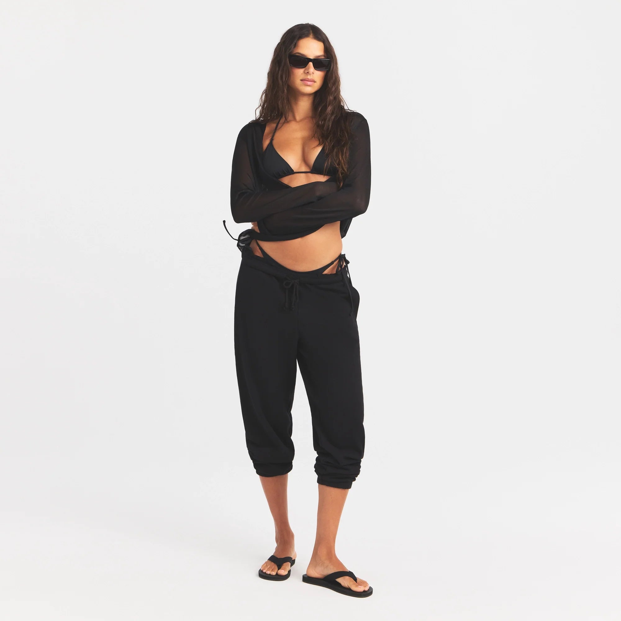 SLINKY KNIT DEEP PLUNGE TOP | OBSIDIAN ON A MODEL FRONT VIEW @ | FOCUS: 0.0, 1.0, 0.9
