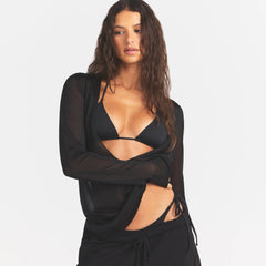 SLINKY KNIT DEEP PLUNGE TOP | OBSIDIAN ON A MODEL SIDE VIEW @ | FOCUS: 0.0, 1.0, 0.9