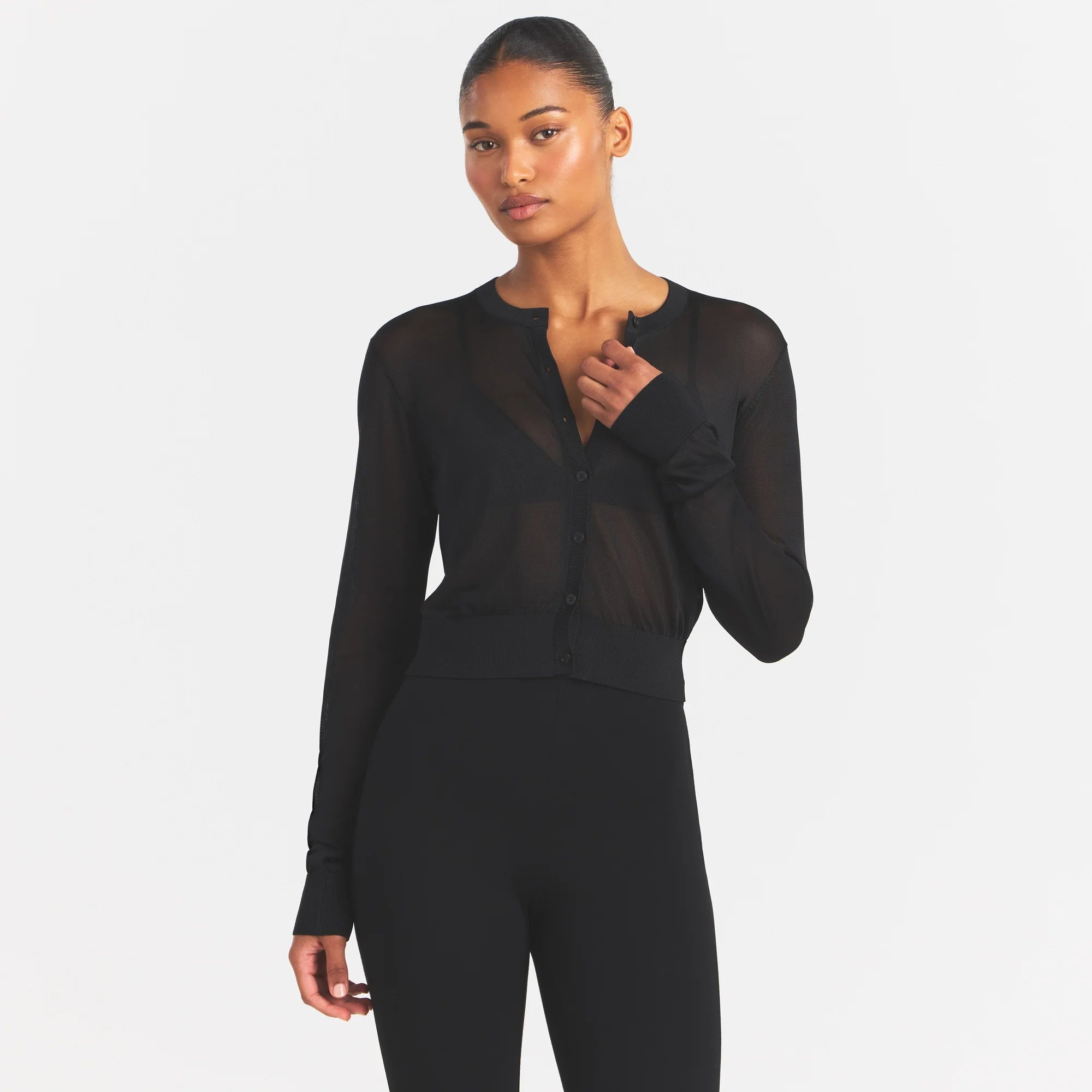 SLINKY KNIT CARDIGAN | OBSIDIAN ON A MODEL SIDE VIEW @ | FOCUS: 0.0, 1.0, 0.9