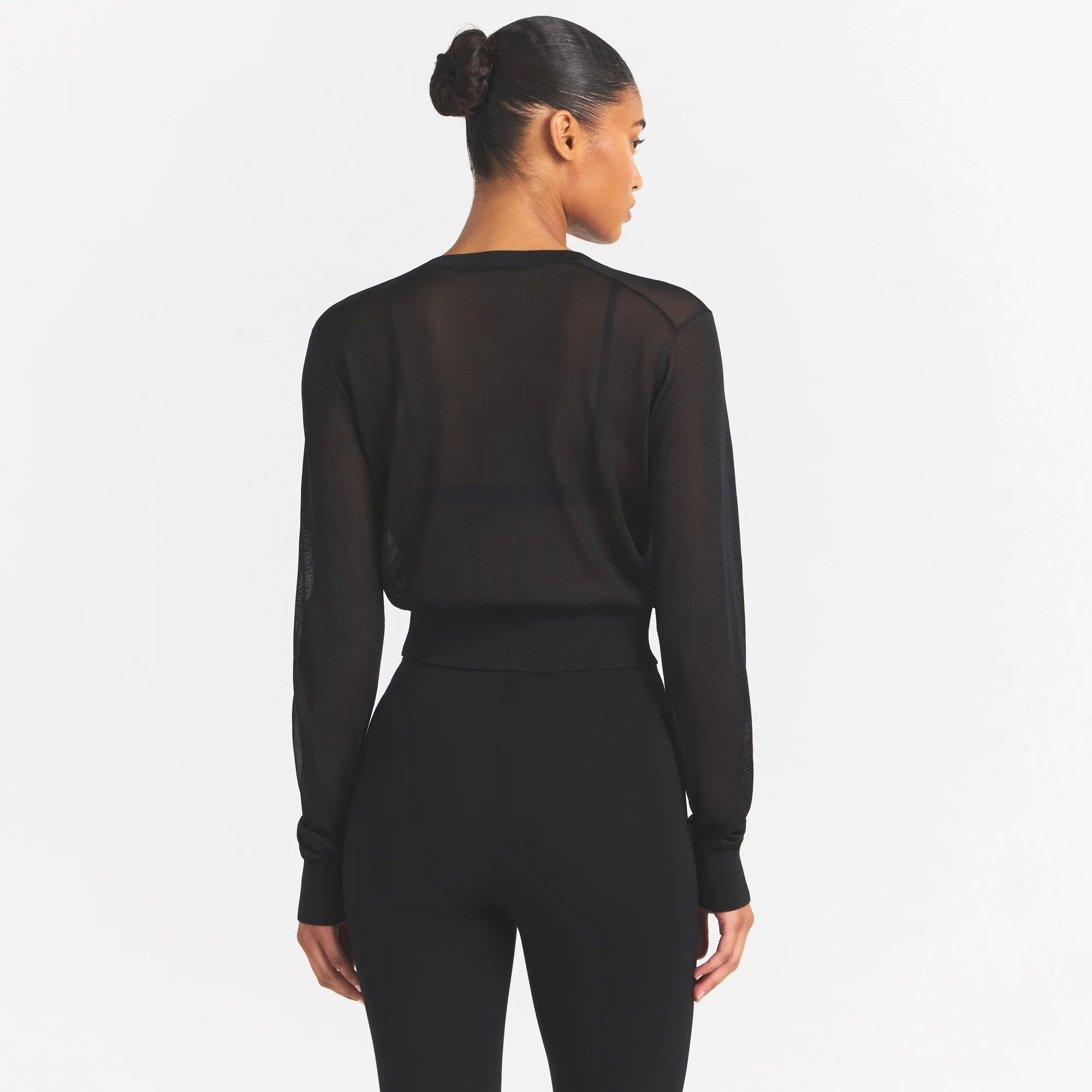 SLINKY KNIT CARDIGAN | OBSIDIAN ON A MODEL SIDE VIEW @ | FOCUS: 0.0, 1.0, 0.9