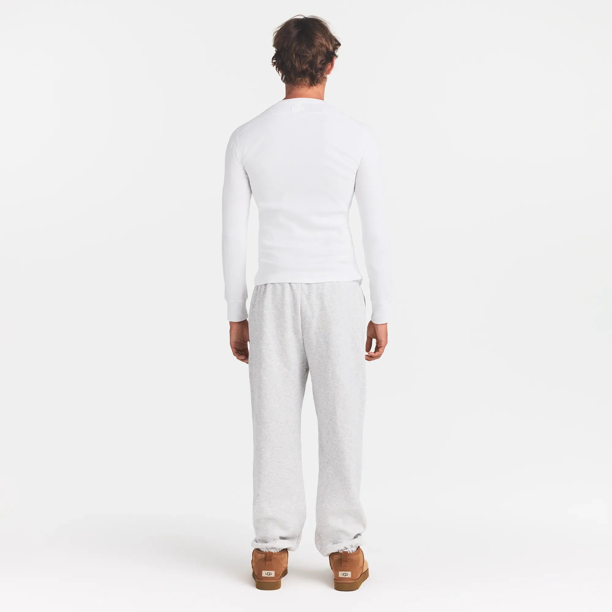 SKIMS COTTON RIB MENS HENLEY | CHALK ON A MODEL BACK VIEW @ | FOCUS: 0.0, 1.0, 0.9