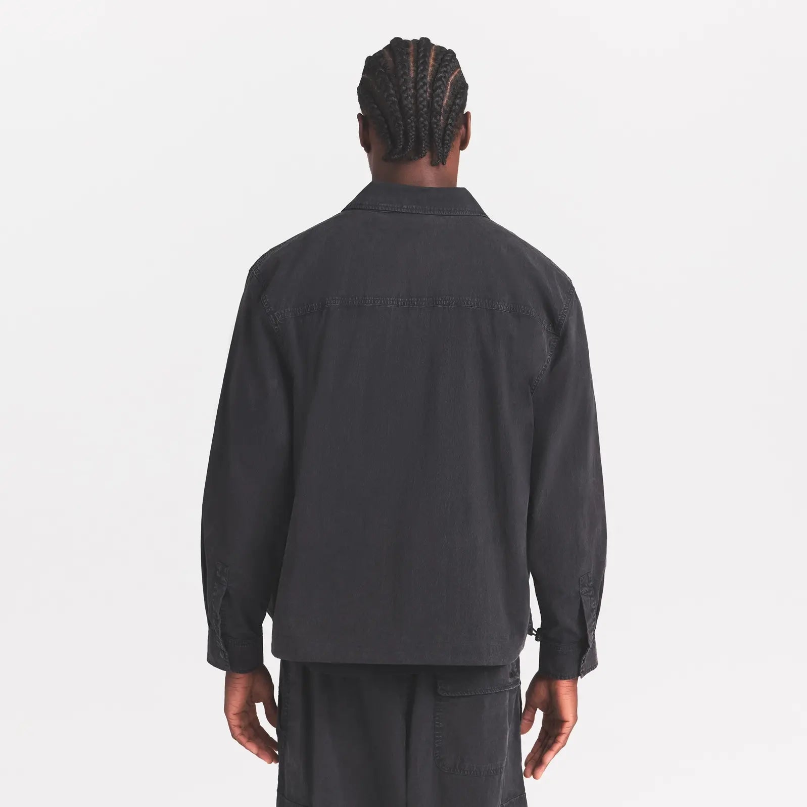 WOVEN MENS RELAXED SHIRT | ONYX ON A MODEL SIDE VIEW @ | FOCUS: 0.0, 1.0, 0.9