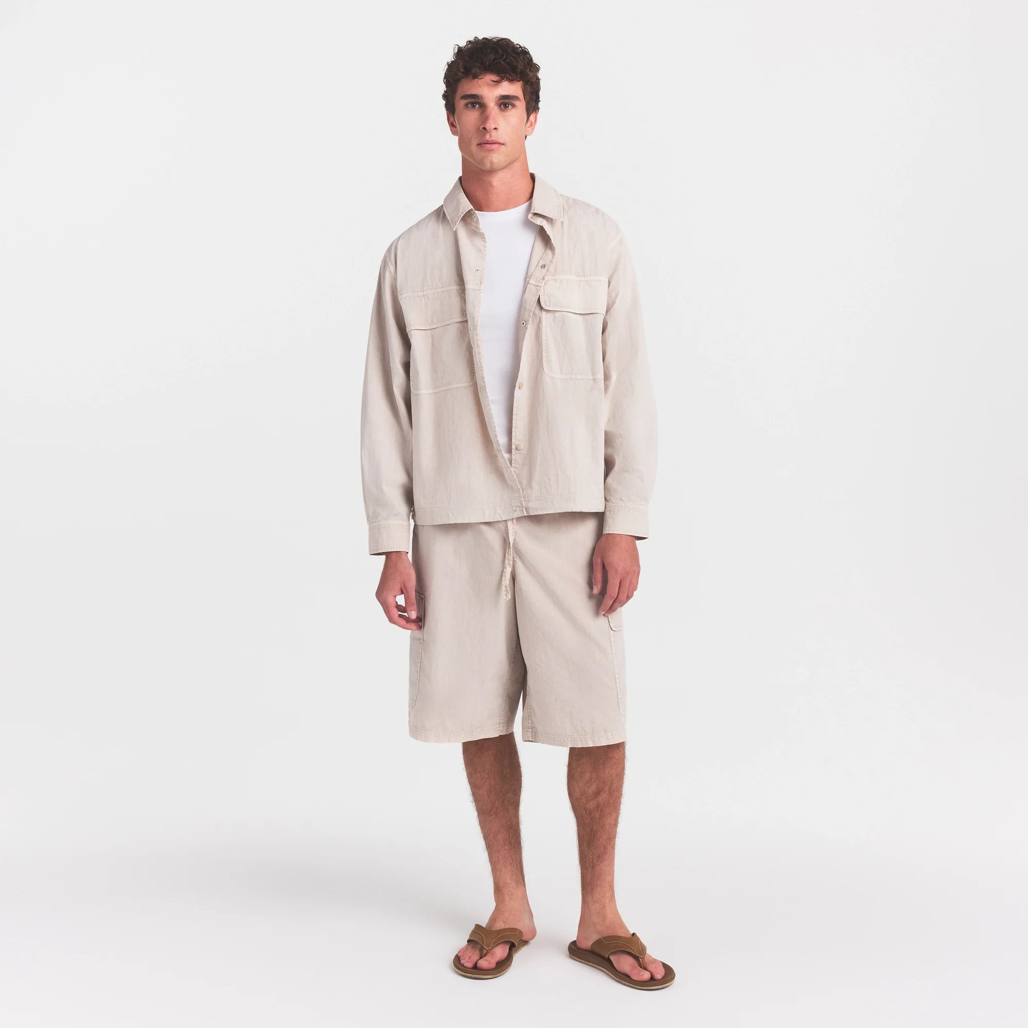 WOVEN MENS RELAXED SHIRT | STONE ON A MODEL FRONT VIEW @ | FOCUS: 0.0, 1.0, 0.9