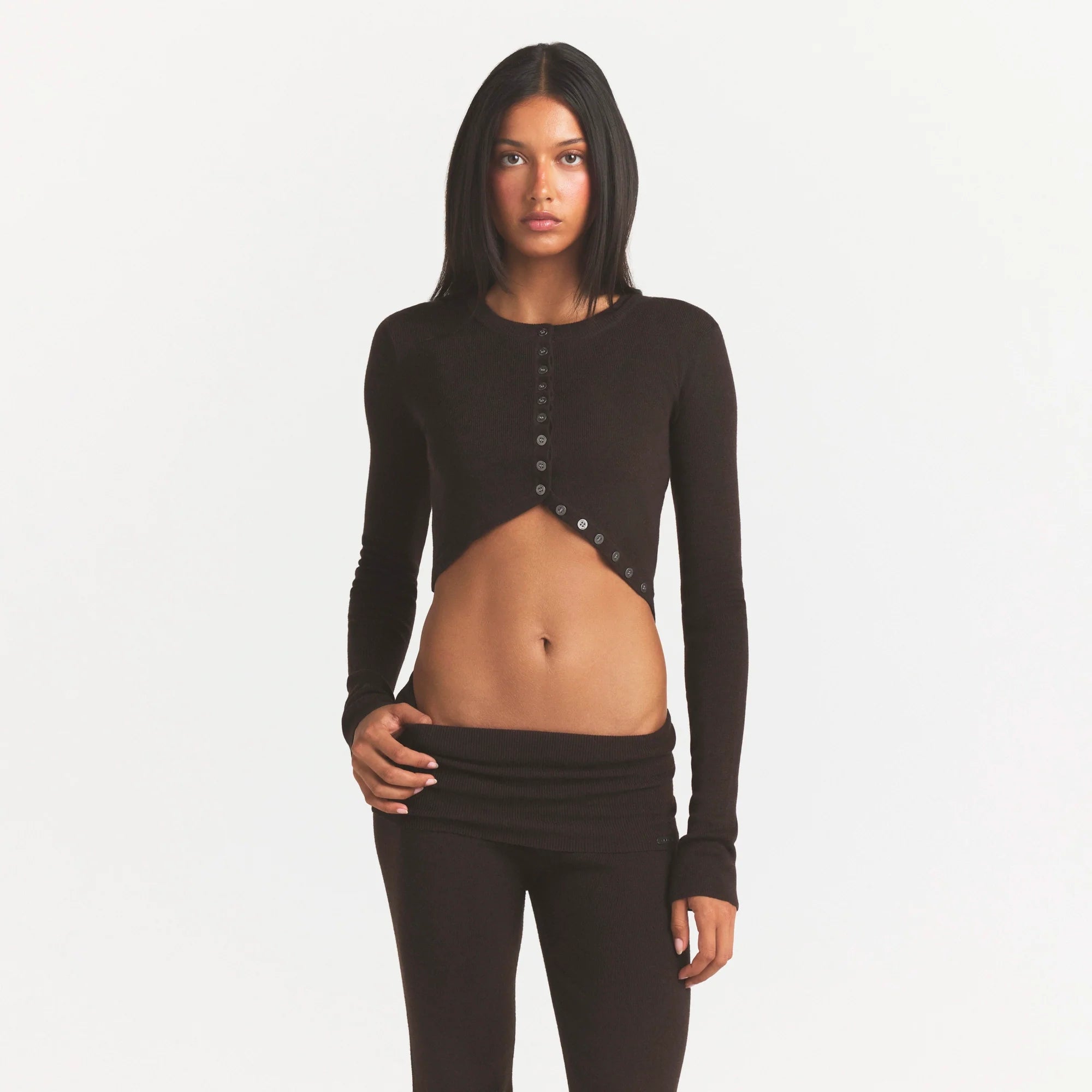 ESSENTIAL KNIT ROUNDED CROPPED CARDIGAN | ESPRESSO & LAYS FLAT ON A WHITE BACKGROUND | FLT