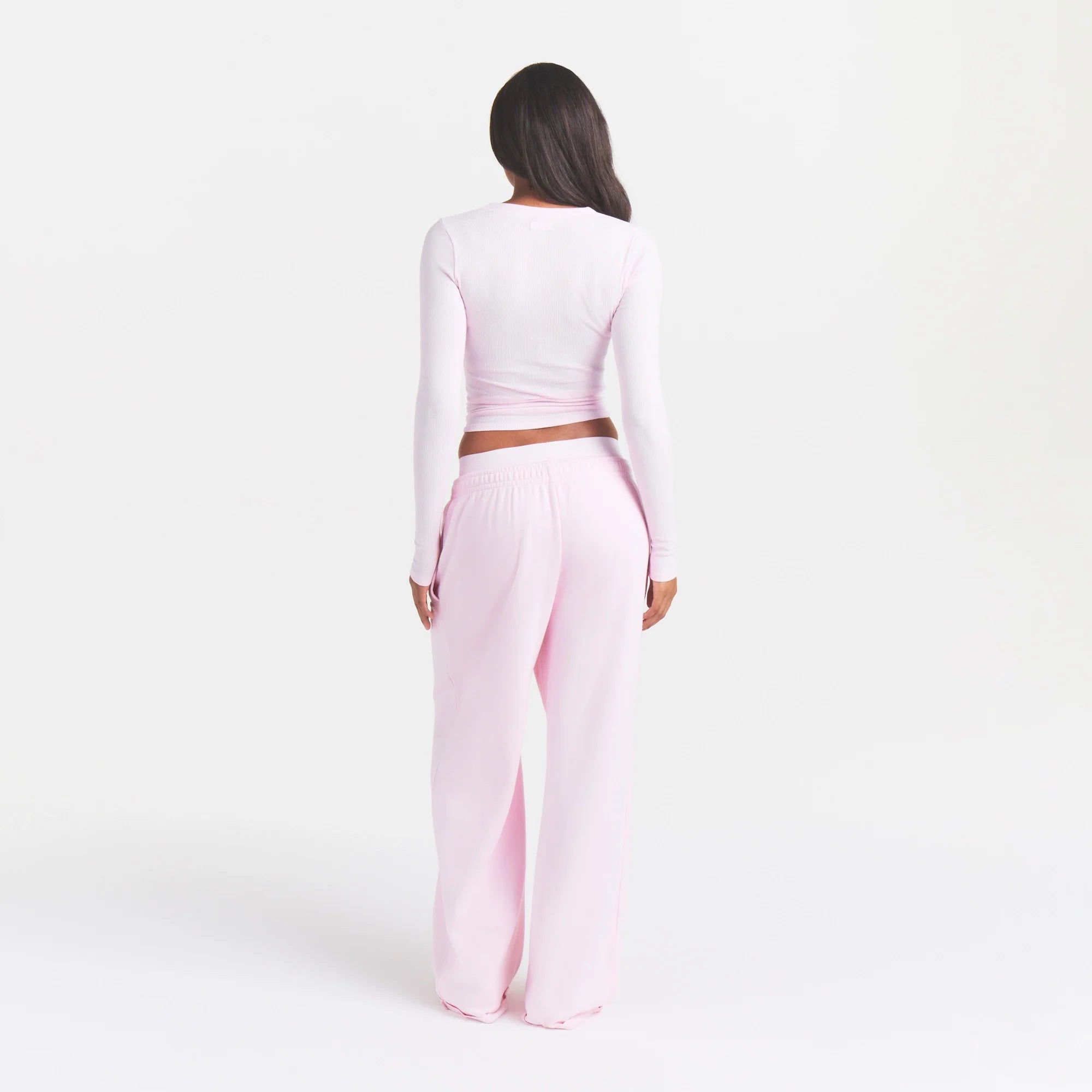 COTTON RIB ZIP UP TOP | CHERRY BLOSSOM ON A MODEL BACK VIEW @ | FOCUS: 0.0, 1.0, 0.9