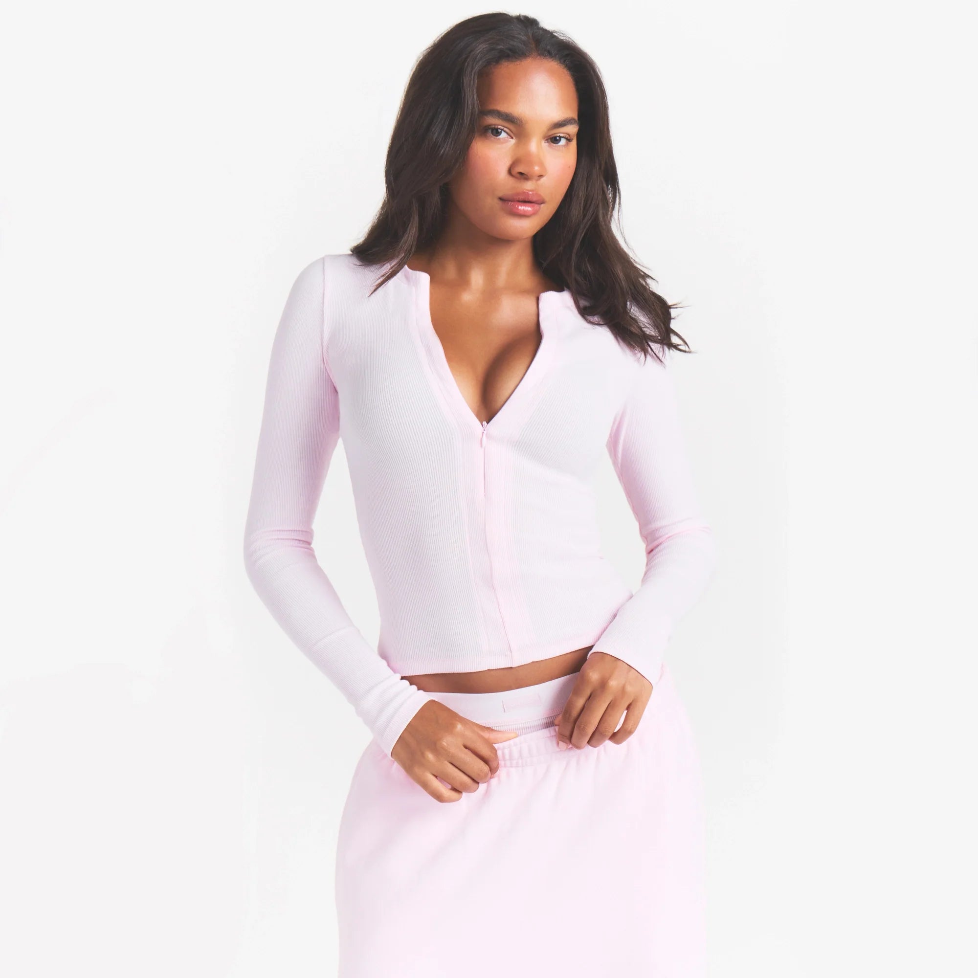 COTTON RIB ZIP UP TOP | CHERRY BLOSSOM ON A MODEL FRONT VIEW @ | FOCUS: 0.0, 1.0, 0.9
