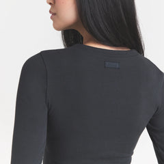 COTTON RIB ZIP UP TOP | SOOT ON A MODEL FRONT VIEW @ | FOCUS: 0.0, 1.0, 0.9