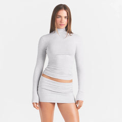 COTTON JERSEY TURTLENECK LONG SLEEVE | LIGHT HEATHER GREY ON A MODEL FRONT VIEW @ | FOCUS: 0.0, 1.0, 0.9