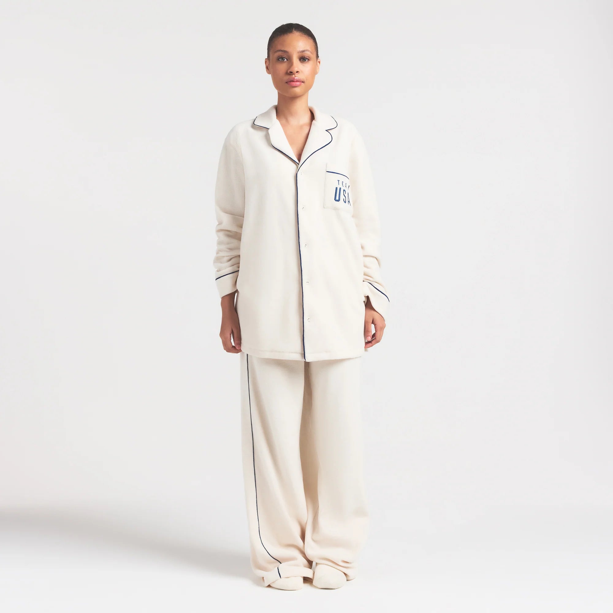 SKIMS FOR TEAM USA UNISEX FLEECE PARALYMPIC OVERSIZED SLEEP TOP | ECRU ON A MODEL FRONT VIEW @ | FOCUS: 0.0, 1.0, 0.9