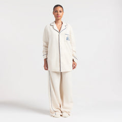 SKIMS FOR TEAM USA UNISEX FLEECE PARALYMPIC OVERSIZED SLEEP TOP | ECRU ON A MODEL FRONT VIEW @ | FOCUS: 0.0, 1.0, 0.9