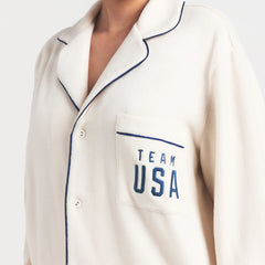 SKIMS FOR TEAM USA UNISEX FLEECE PARALYMPIC OVERSIZED SLEEP TOP | ECRU ON A MODEL SIDE VIEW @ | FOCUS: 0.0, 1.0, 0.9