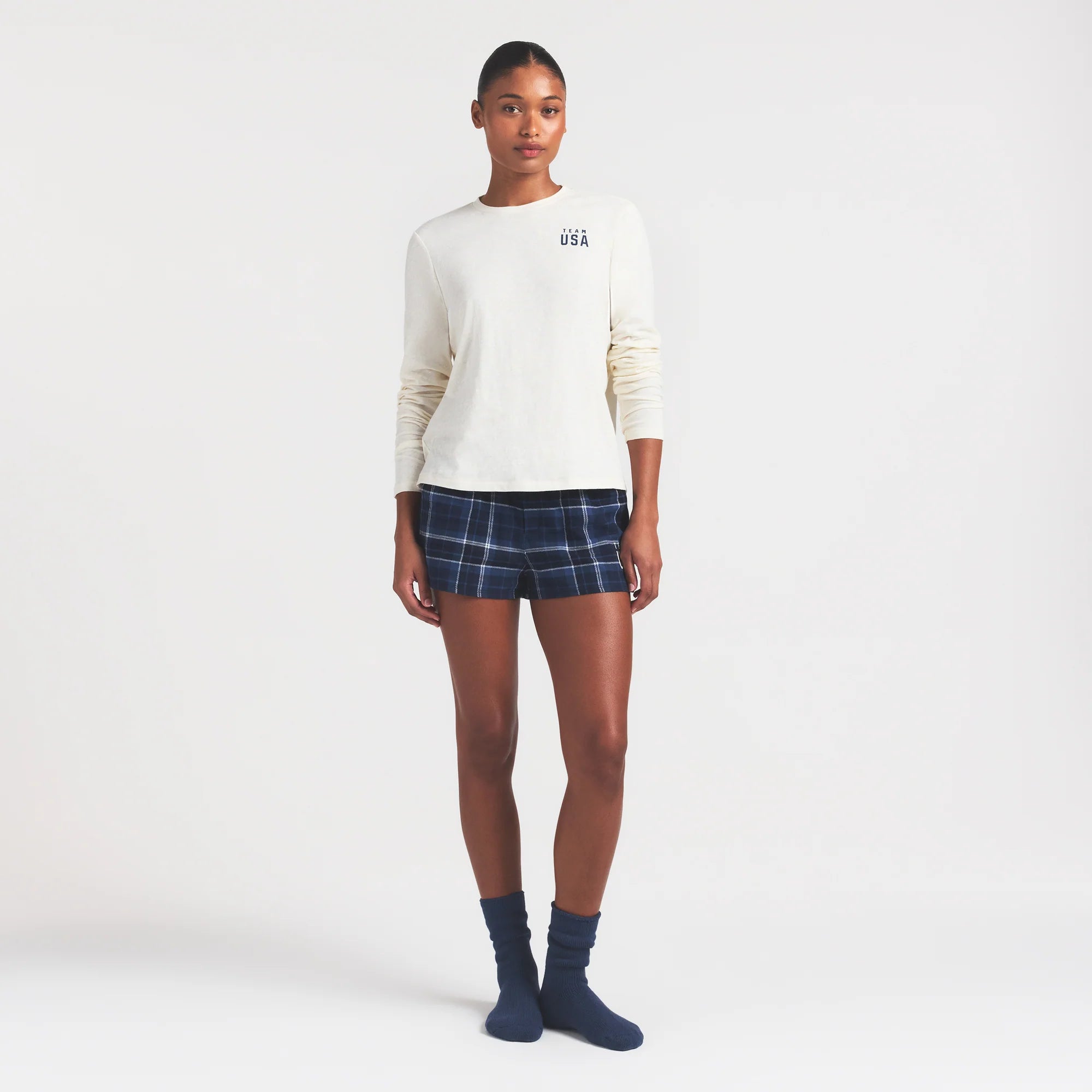 SKIMS FOR TEAM USA WORN IN JERSEY OLYMPIC LONG SLEEVE T-SHIRT | ECRU ON A MODEL FRONT VIEW @ | FOCUS: 0.0, 1.0, 0.9