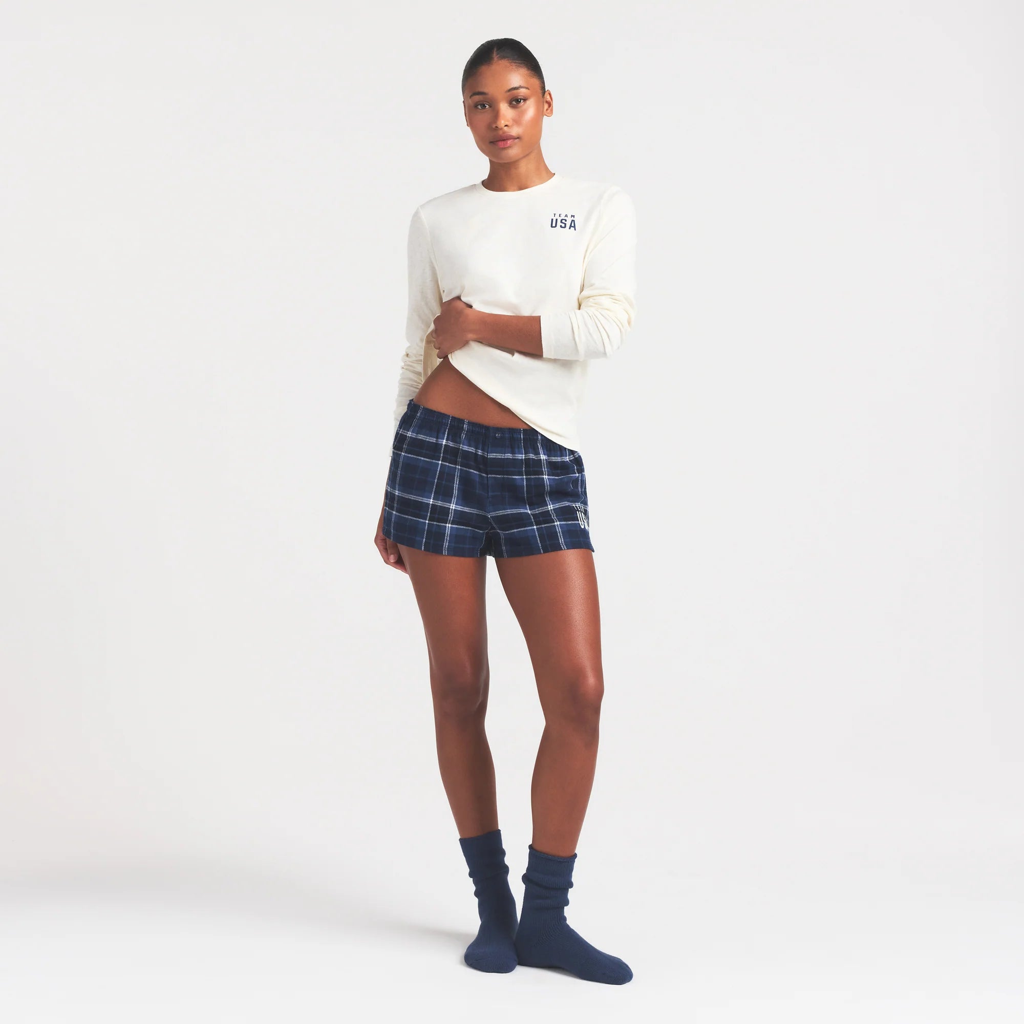 SKIMS FOR TEAM USA WORN IN JERSEY OLYMPIC LONG SLEEVE T-SHIRT | ECRU ON A MODEL FRONT VIEW @ | FOCUS: 0.0, 1.0, 0.9