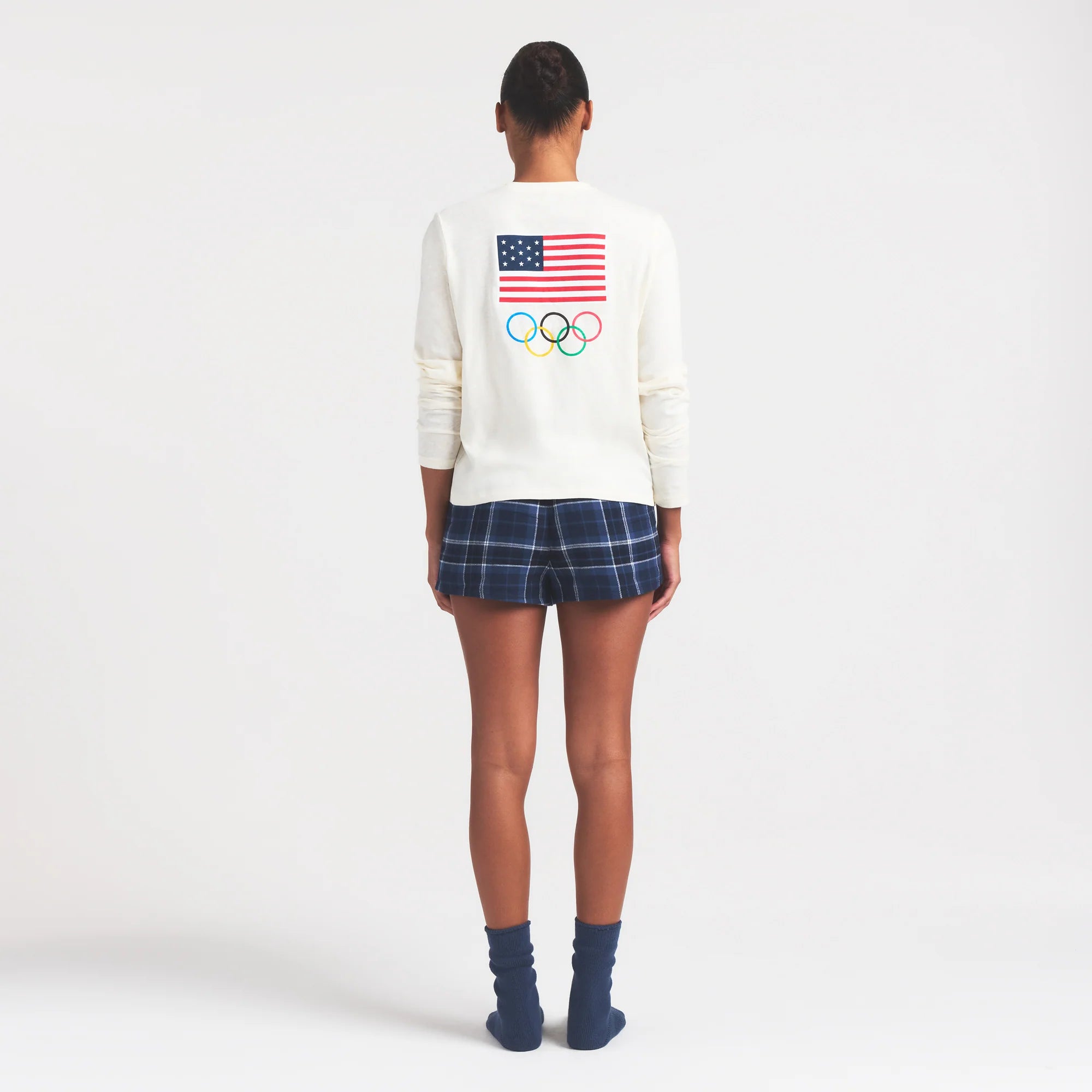 SKIMS FOR TEAM USA WORN IN JERSEY OLYMPIC LONG SLEEVE T-SHIRT | ECRU ON A MODEL FRONT VIEW @ | FOCUS: 0.0, 1.0, 0.9