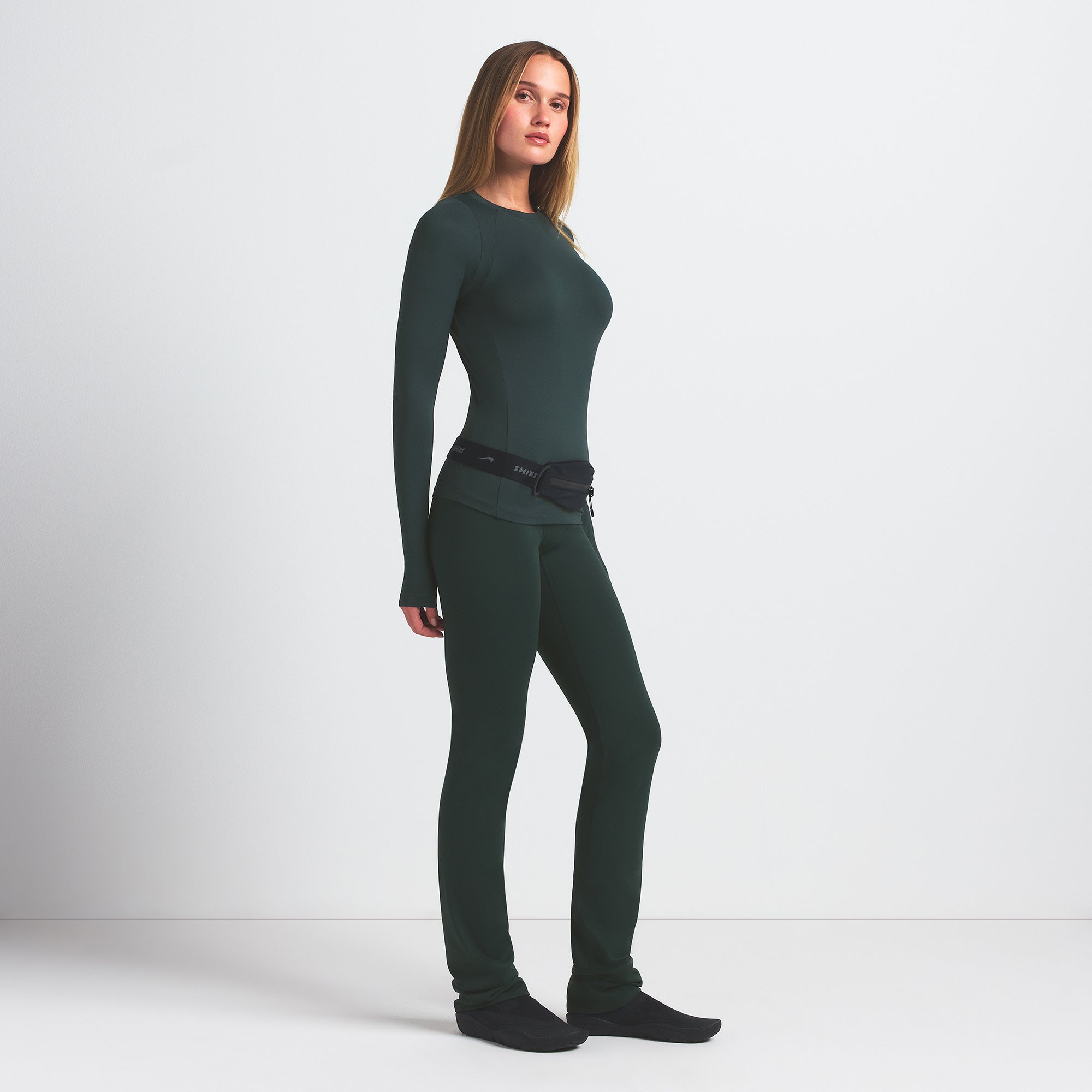 NikeSKIMS AIRY LONG SLEEVE CREW NECK TOP | DARK TEAL ON A MODEL FRONT VIEW @ | FOCUS: 0.0, 1.0, 0.9