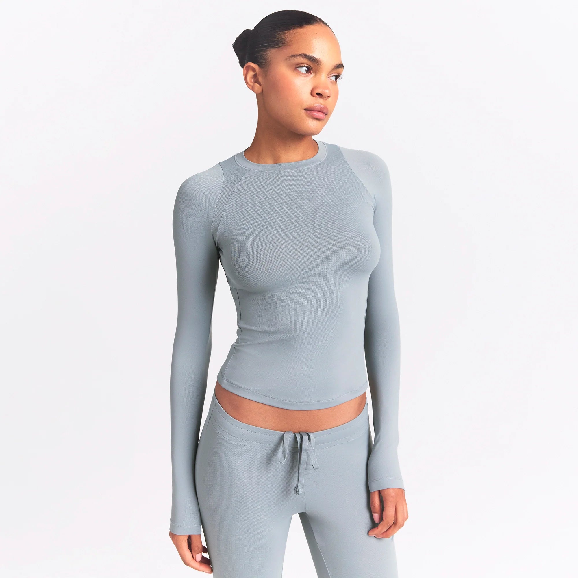 NikeSKIMS AIRY LONG SLEEVE CREW NECK TOP | WASHED PACIFIC ON A MODEL SIDE VIEW @ | FOCUS: 0.0, 1.0, 0.9