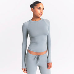 NikeSKIMS AIRY LONG SLEEVE CREW NECK TOP | WASHED PACIFIC ON A MODEL SIDE VIEW @ | FOCUS: 0.0, 1.0, 0.9