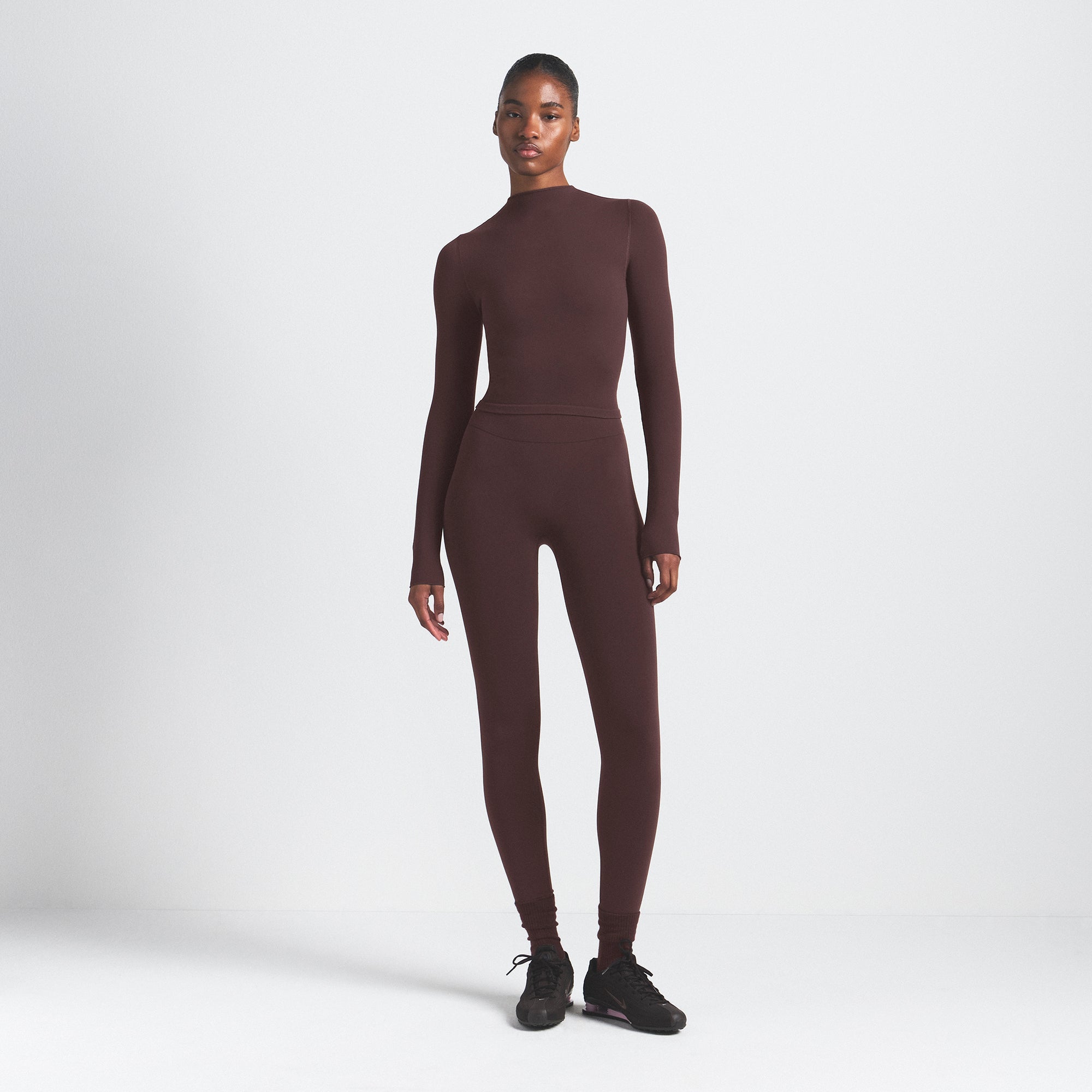 NikeSKIMS VINTAGE SEAMLESS MOCK NECK CROP TOP | PHOENIX ON A MODEL FRONT VIEW