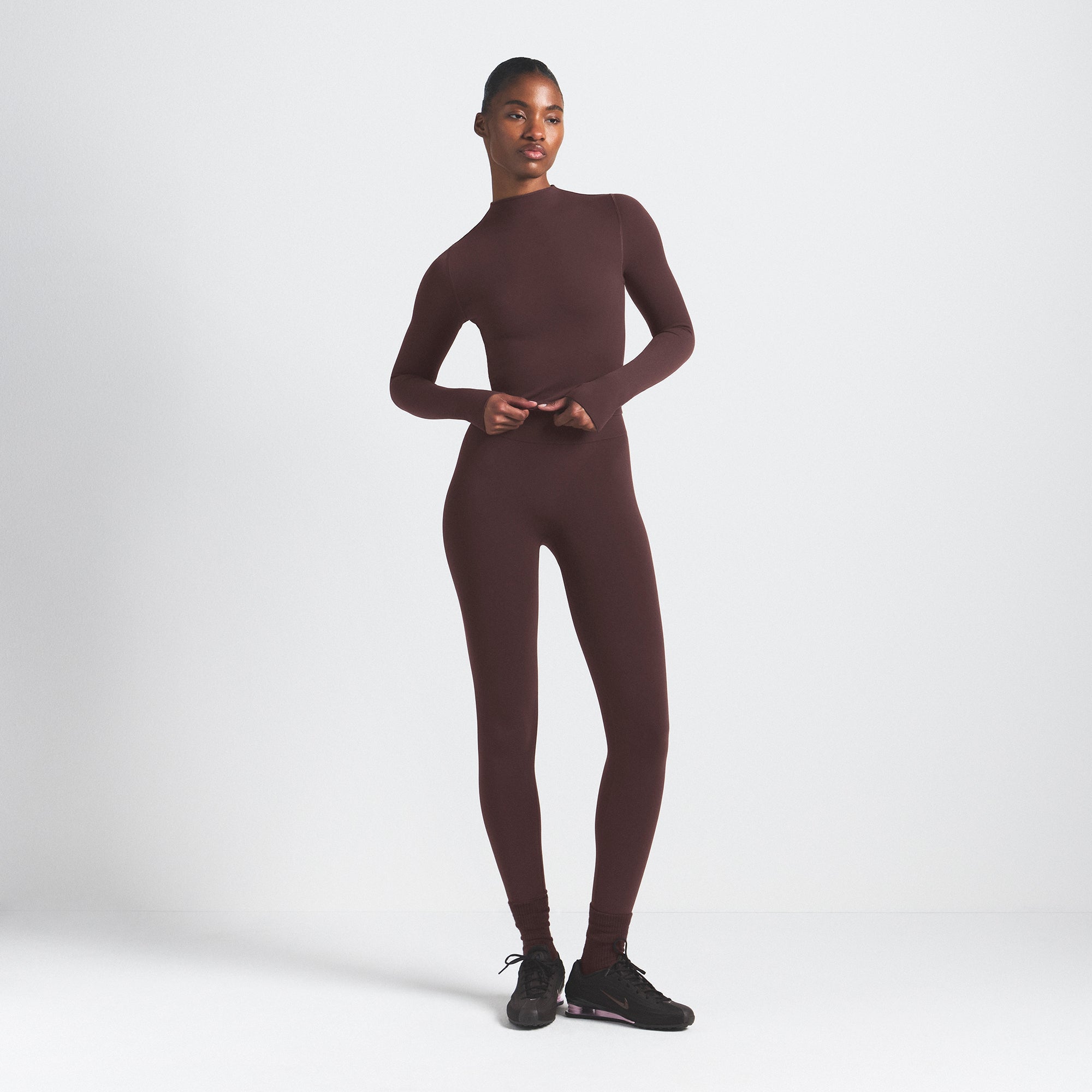 NikeSKIMS VINTAGE SEAMLESS MOCK NECK CROP TOP | PHOENIX ON A MODEL FRONT VIEW