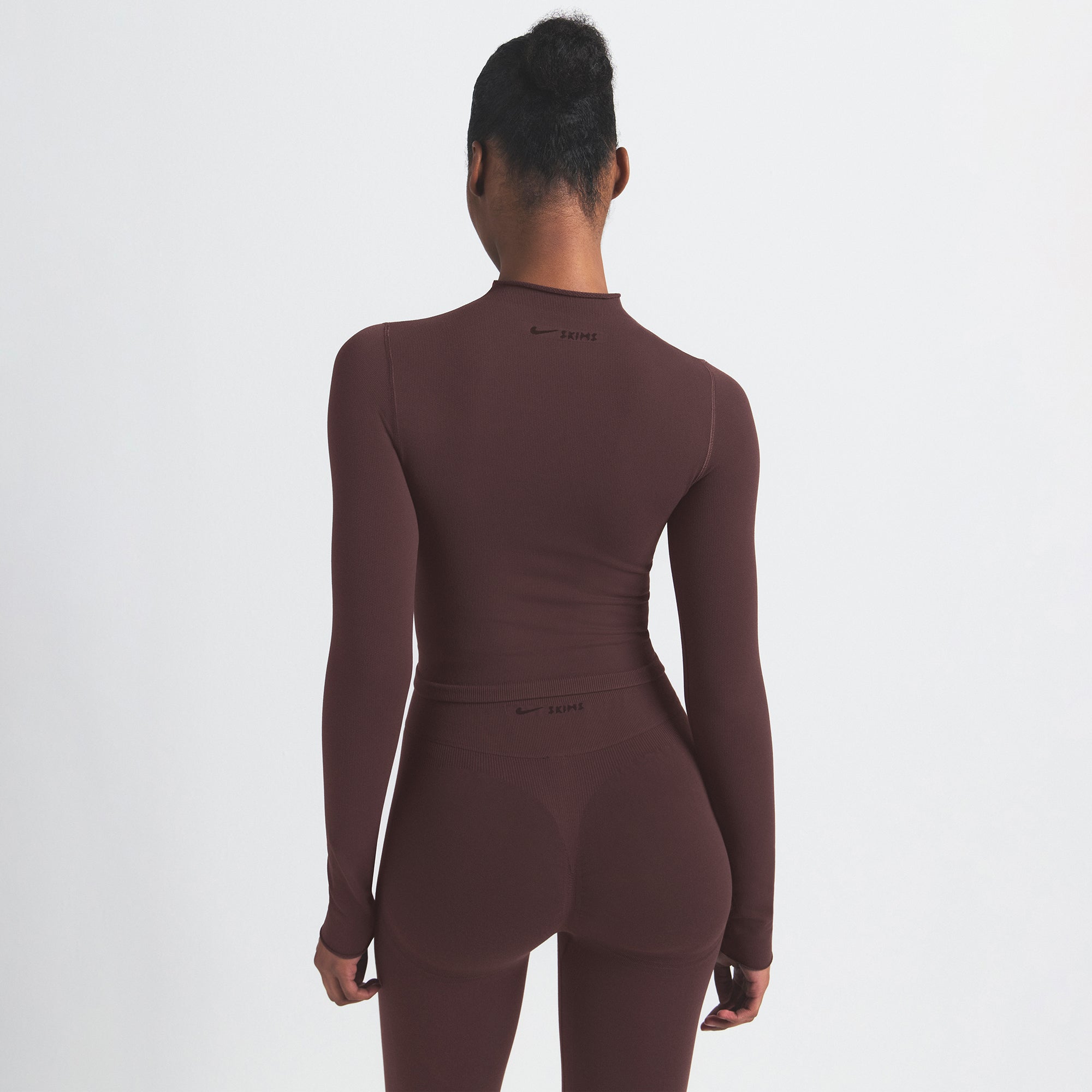 NikeSKIMS VINTAGE SEAMLESS MOCK NECK CROP TOP | PHOENIX ON A MODEL SIDE VIEW