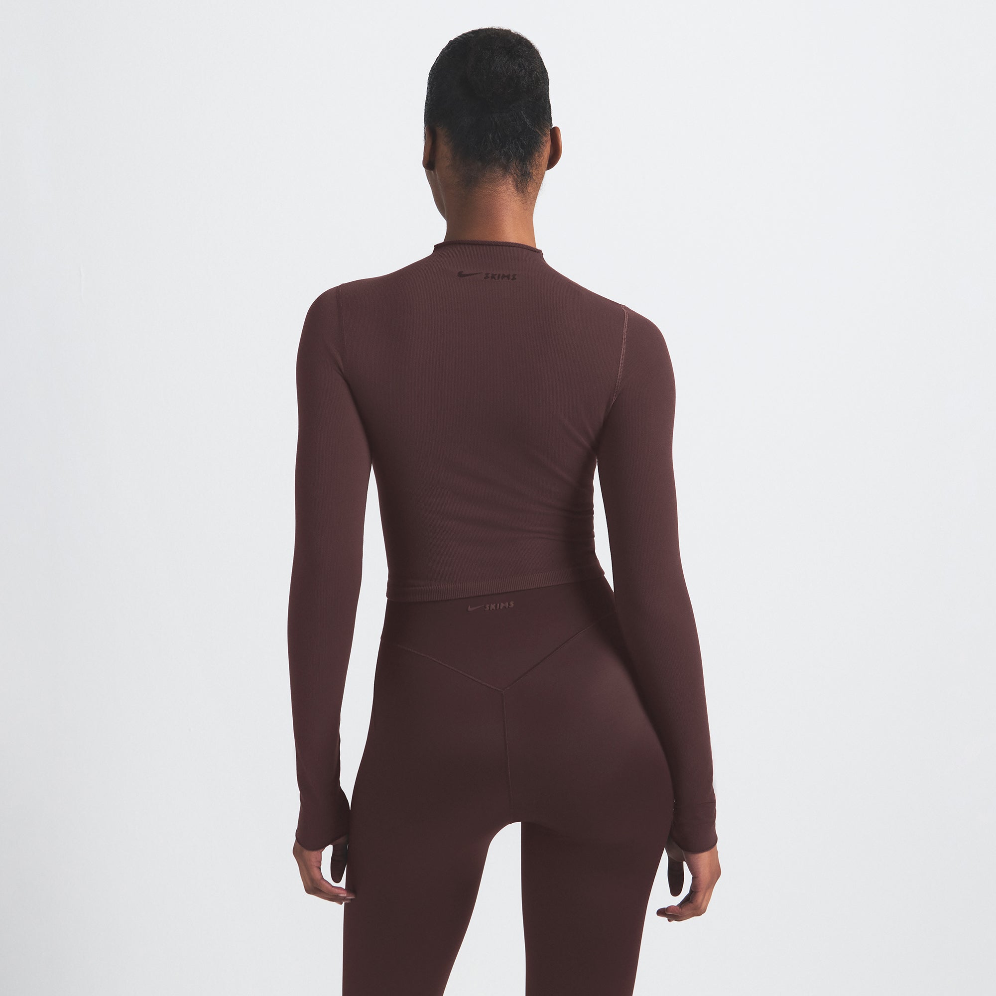 NikeSKIMS VINTAGE SEAMLESS MOCK NECK CROP TOP | PHOENIX ON A MODEL SIDE VIEW