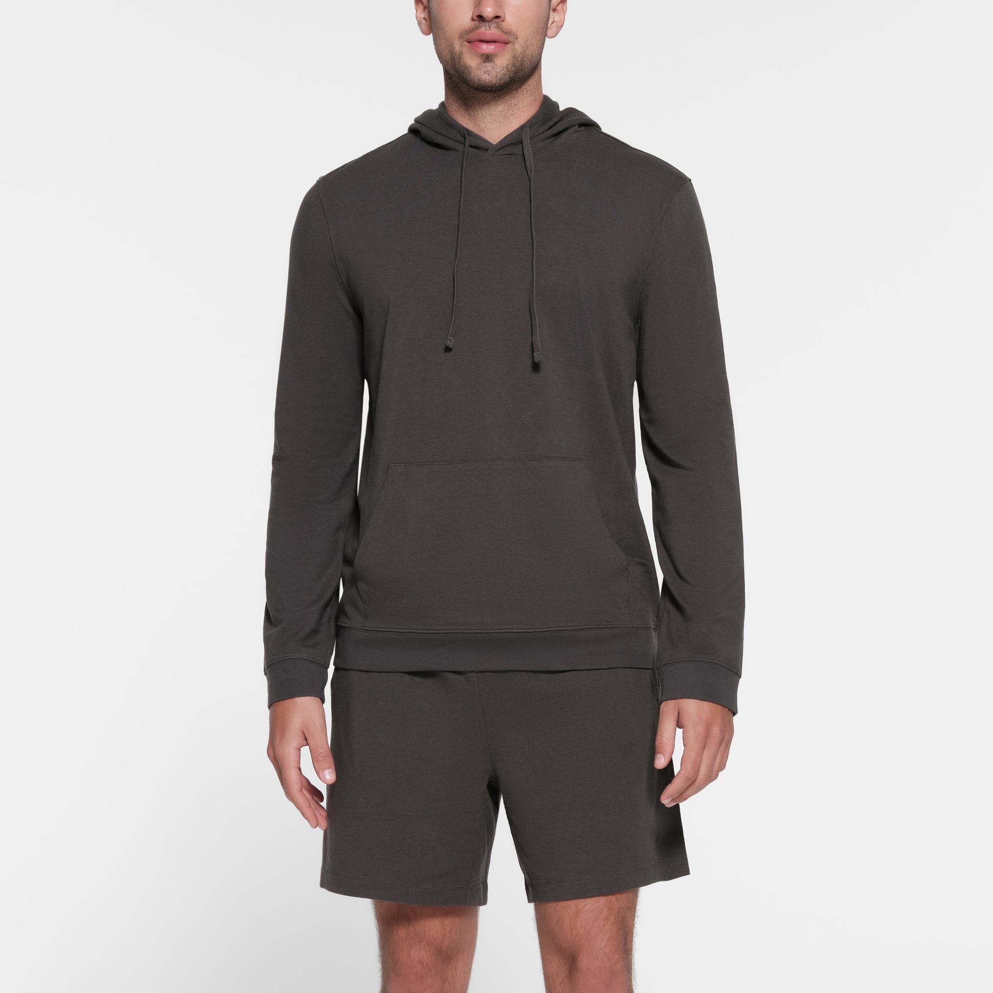 JERSEY LOUNGE MENS HOODIE | ASH ON A MODEL FRONT VIEW
