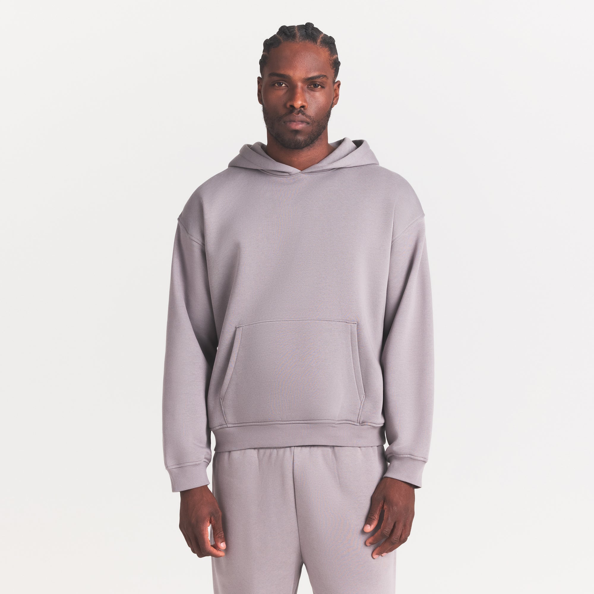 FLEECE LOUNGE MENS CLASSIC HOODIE | SHADOW ON A MODEL SIDE VIEW @ | FOCUS: 0.0, 1.0, 0.9