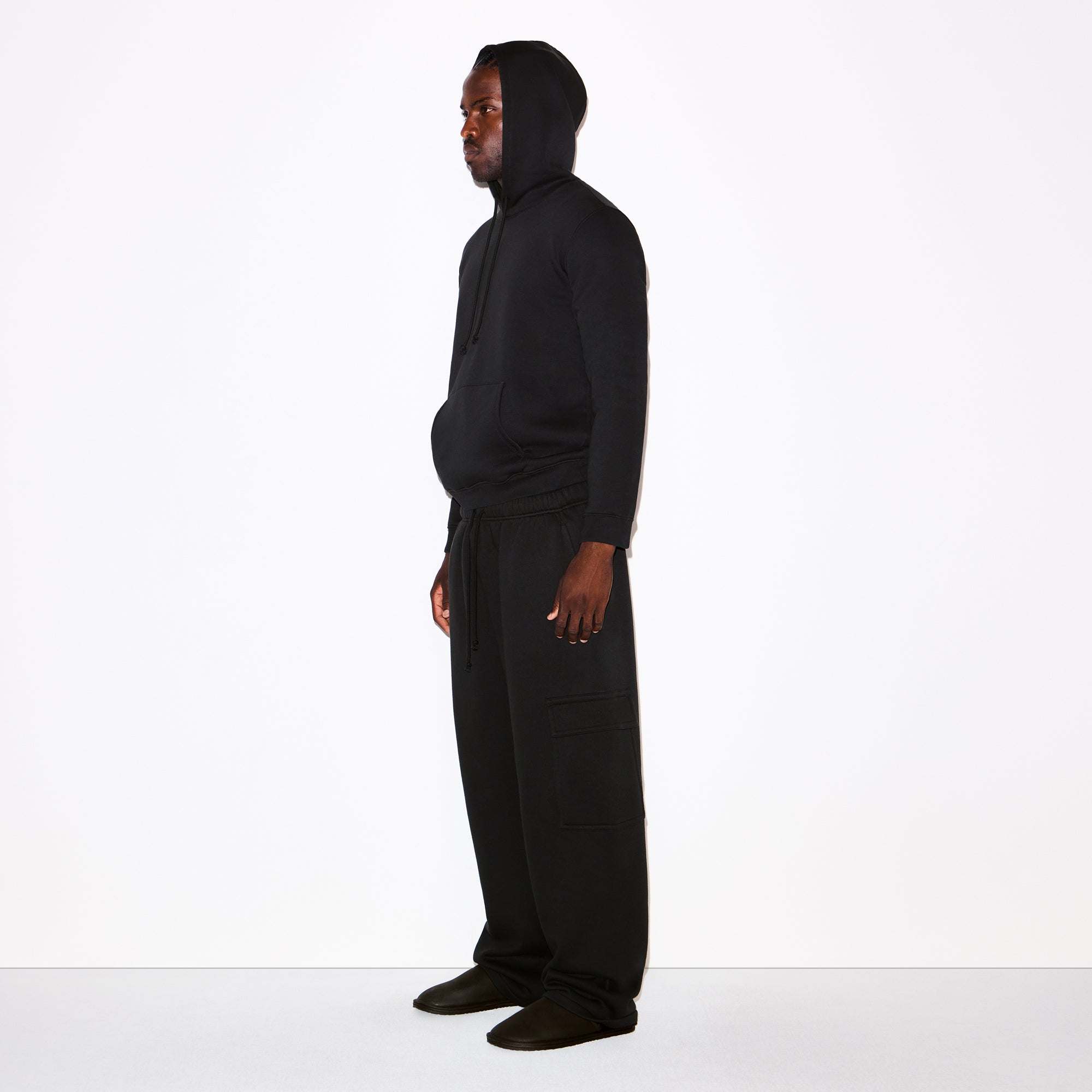 FLEECE LOUNGE MENS CLASSIC HOODIE | WASHED ONYX ON A MODEL FRONT VIEW @ | FOCUS: 0.0, 1.0, 0.9