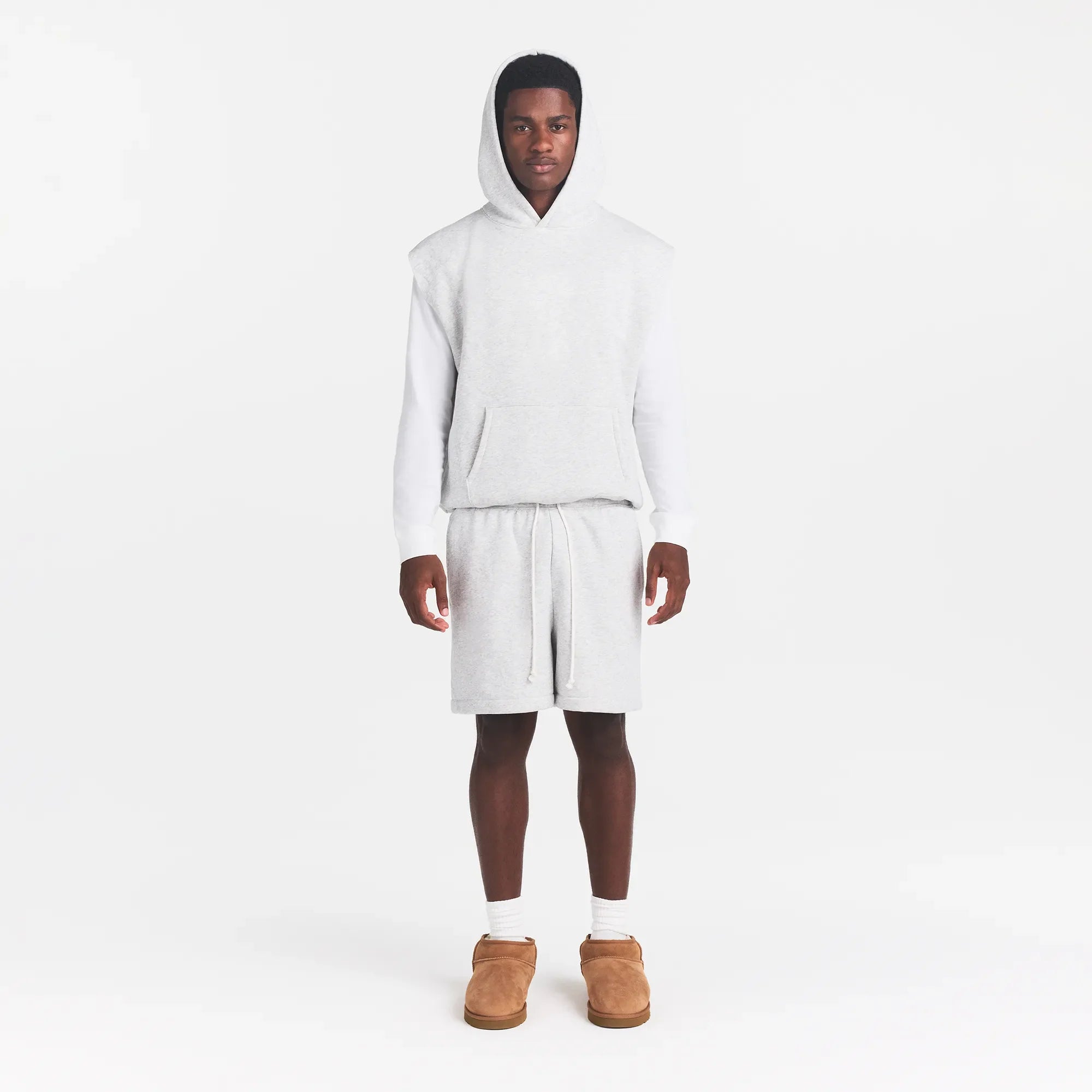 FLEECE LOUNGE MENS SLEEVELESS HOODIE | LIGHT HEATHER GREY ON A MODEL FRONT VIEW @ | FOCUS: 0.0, 1.0, 0.9