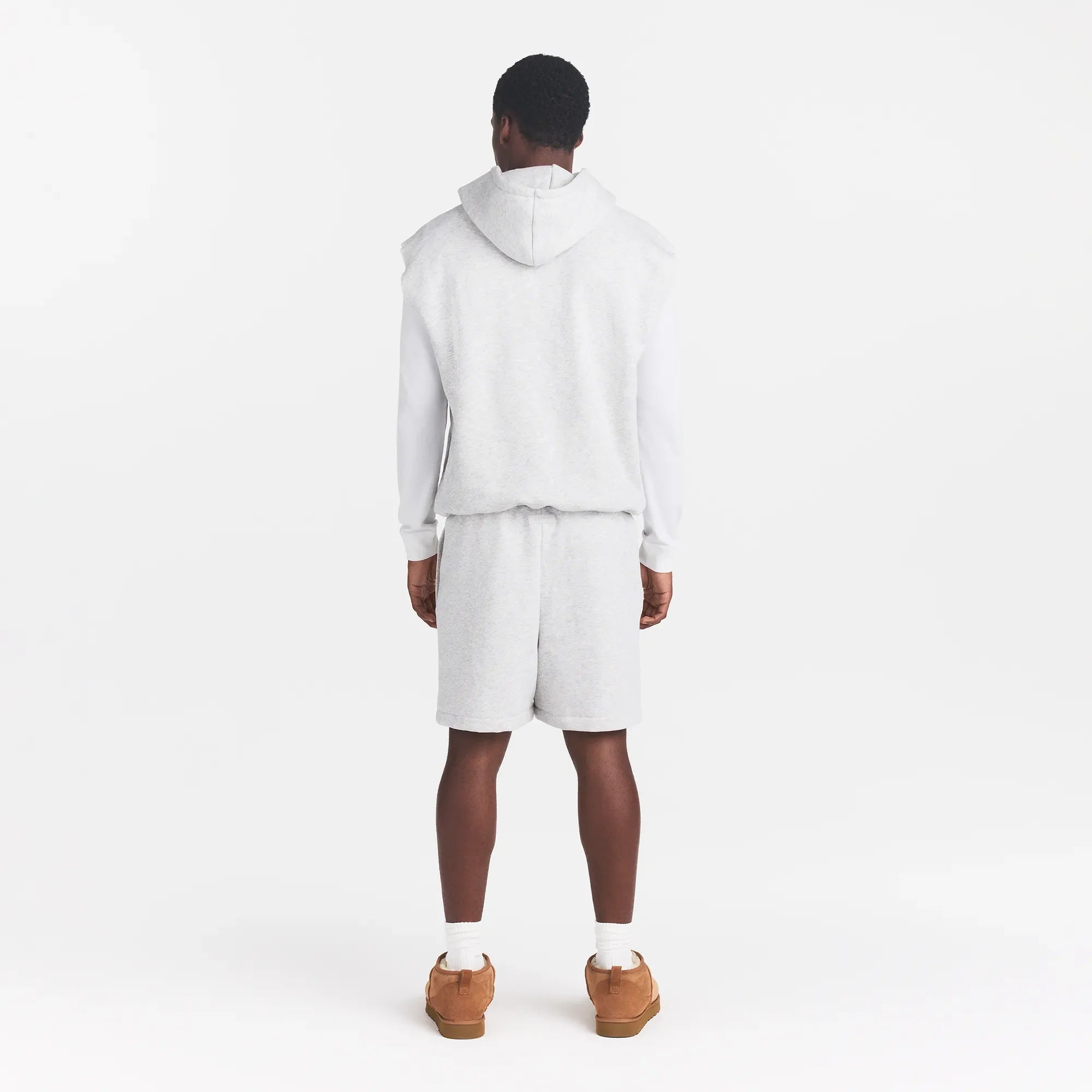 FLEECE LOUNGE MENS SLEEVELESS HOODIE | LIGHT HEATHER GREY ON A MODEL BACK VIEW @ | FOCUS: 0.0, 1.0, 0.9