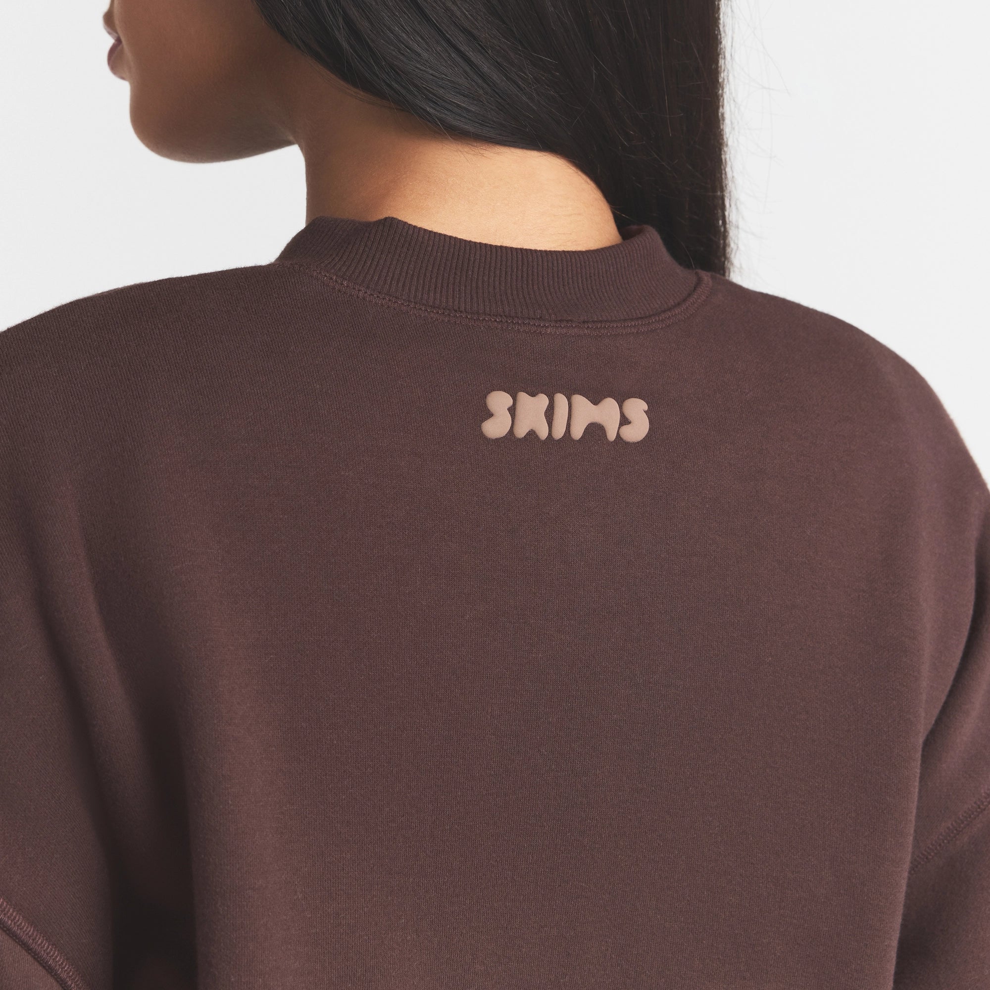 COTTON FLEECE BOMBER | ESPRESSO ON A MODEL SIDE VIEW @ | FOCUS: 0.0, 1.0, 0.9