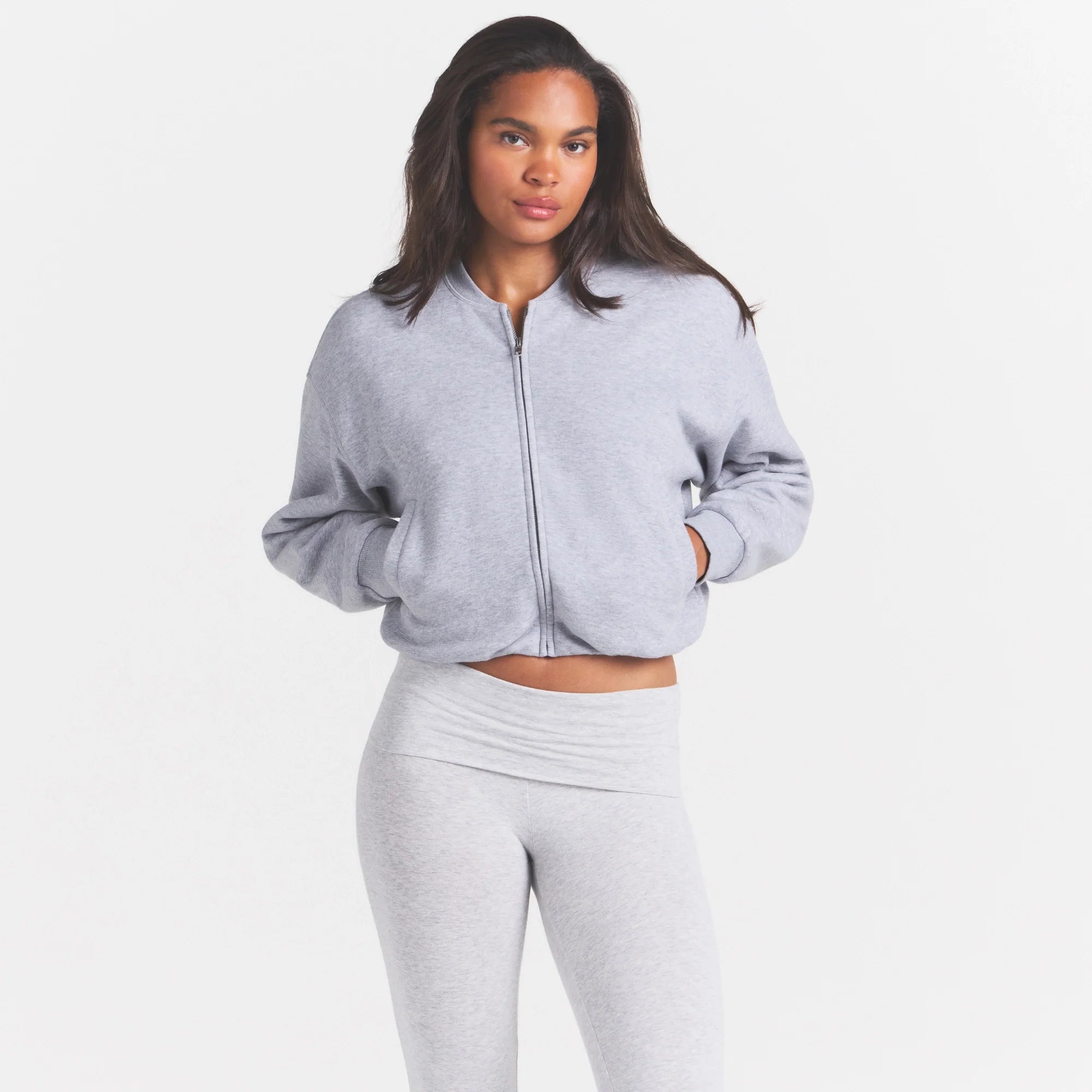 COTTON FLEECE BOMBER | HEATHER GREY ON A MODEL SIDE VIEW @ | FOCUS: 0.0, 1.0, 0.9