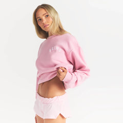 COTTON FLEECE CLASSIC CREWNECK | HALITE WITH SNOW LOGO ON A MODEL SIDE VIEW @ | FOCUS: 0.0, 1.0, 0.9