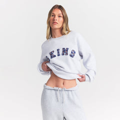COTTON FLEECE CLASSIC CREWNECK | PLAID ARCHED LOGO PATCH ON A MODEL FRONT VIEW @ | FOCUS: 0.0, 1.0, 0.9