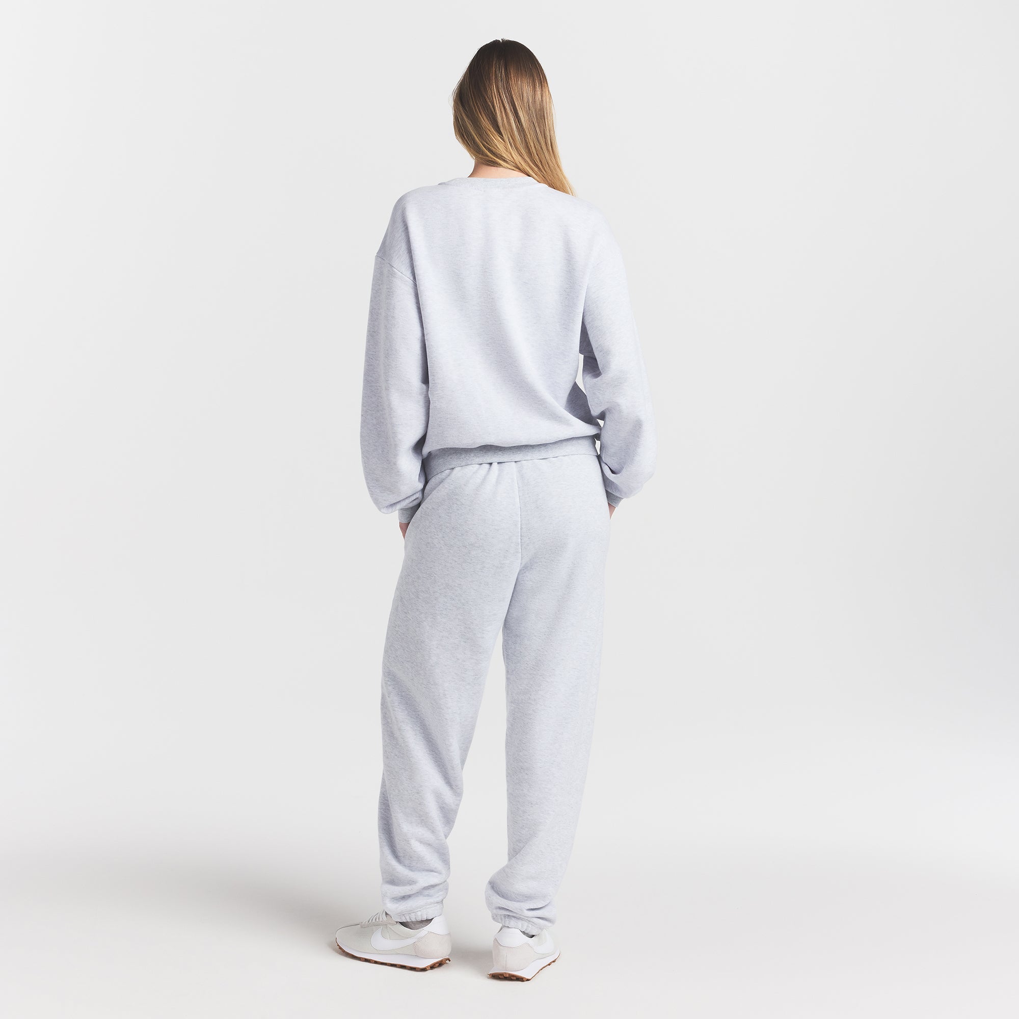 COTTON FLEECE CLASSIC CREWNECK | PLAID ARCHED LOGO PATCH ON A MODEL BACK VIEW @ | FOCUS: 0.0, 1.0, 0.9