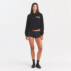 COTTON FLEECE CLASSIC HOODIE | ONYX SNOW ARCHED SKIMS LOGO ON A MODEL | FLT@ | FOCUS: 0.0, 1.0, 0.9