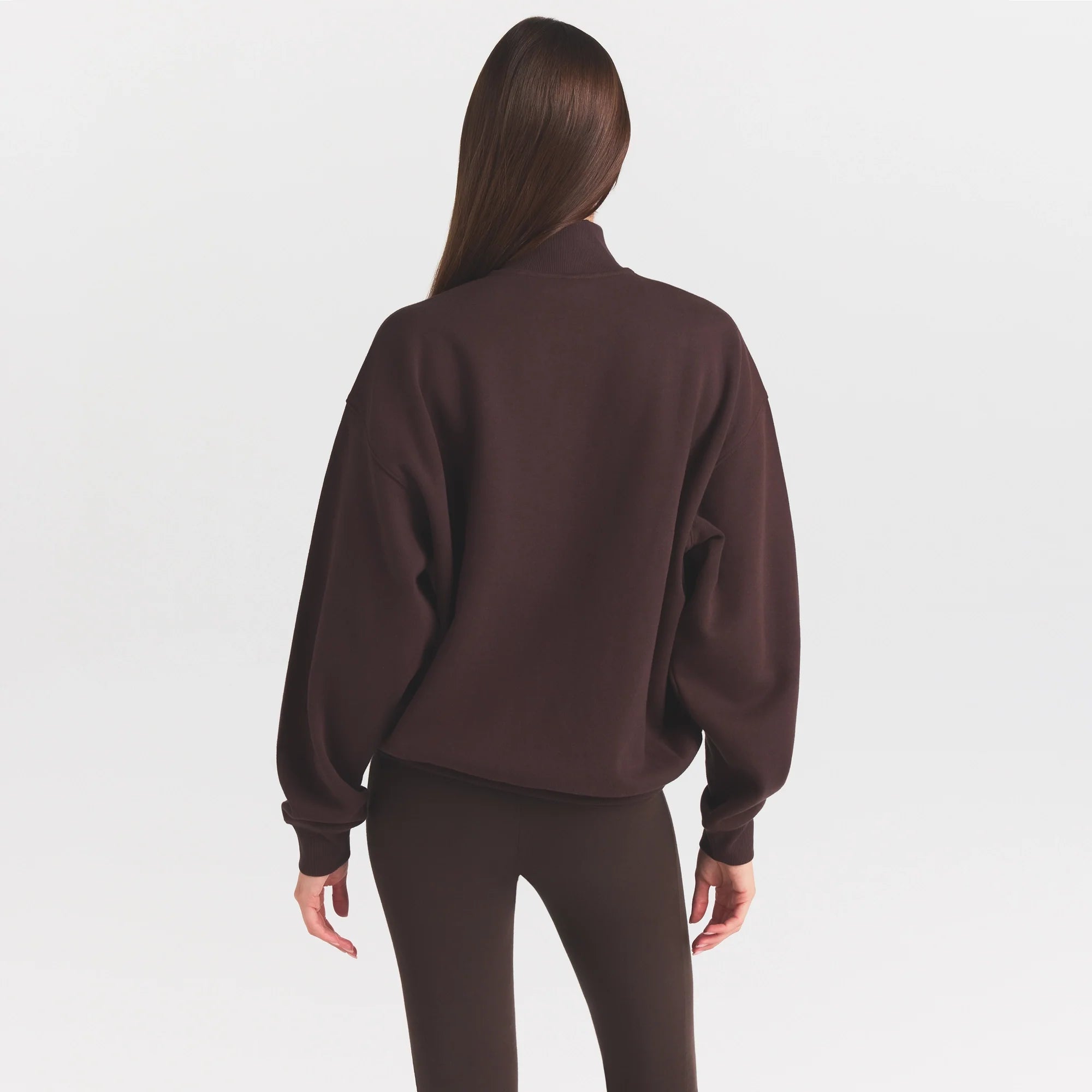 COTTON FLEECE MOCK NECK QUARTER ZIP WITH EMBOSSED LOGO | ESPRESSO ON A MODEL SIDE VIEW @ | FOCUS: 0.0, 1.0, 0.9