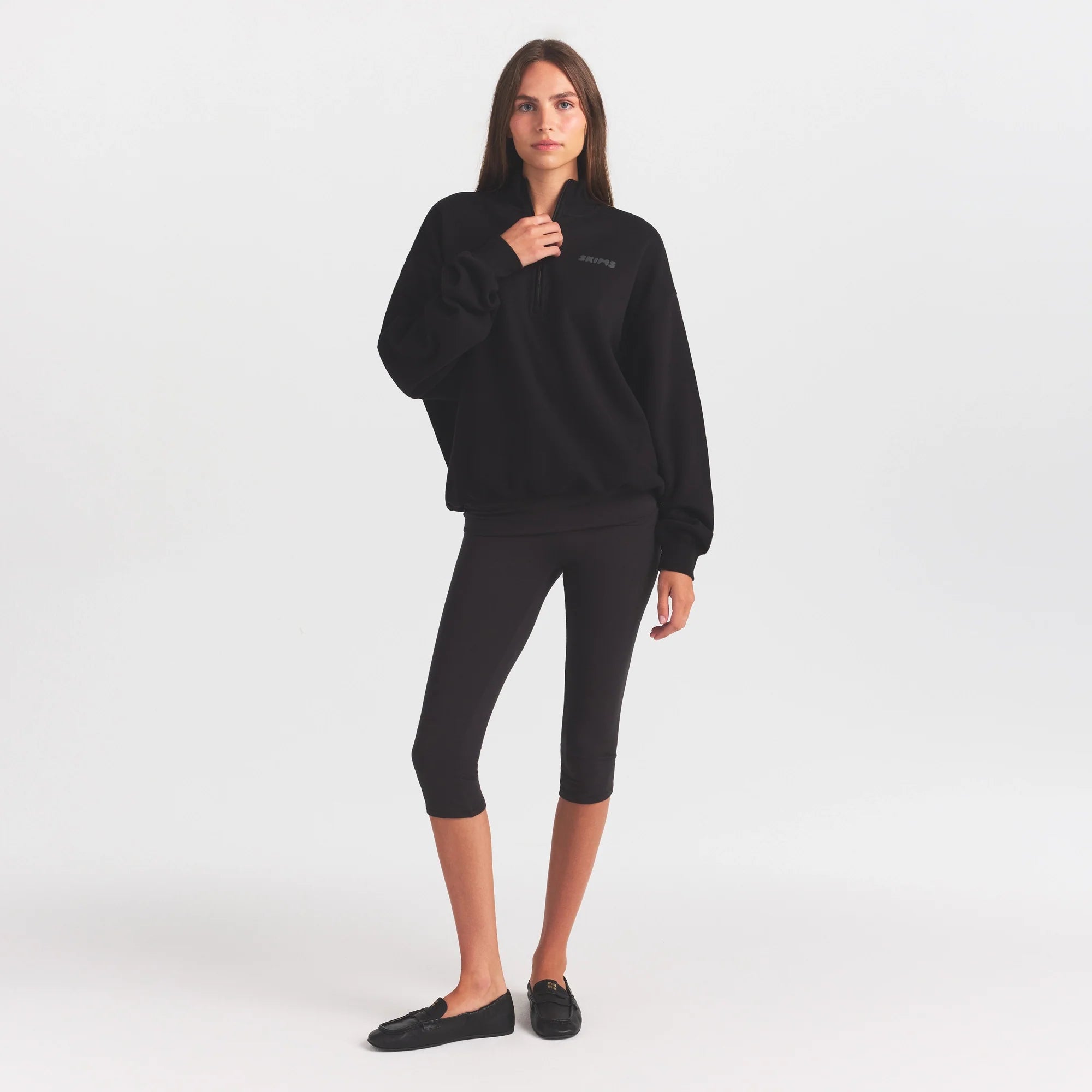 COTTON FLEECE MOCK NECK QUARTER ZIP WITH EMBOSSED LOGO | ONYX ON A MODEL FRONT VIEW @ | FOCUS: 0.0, 1.0, 0.9