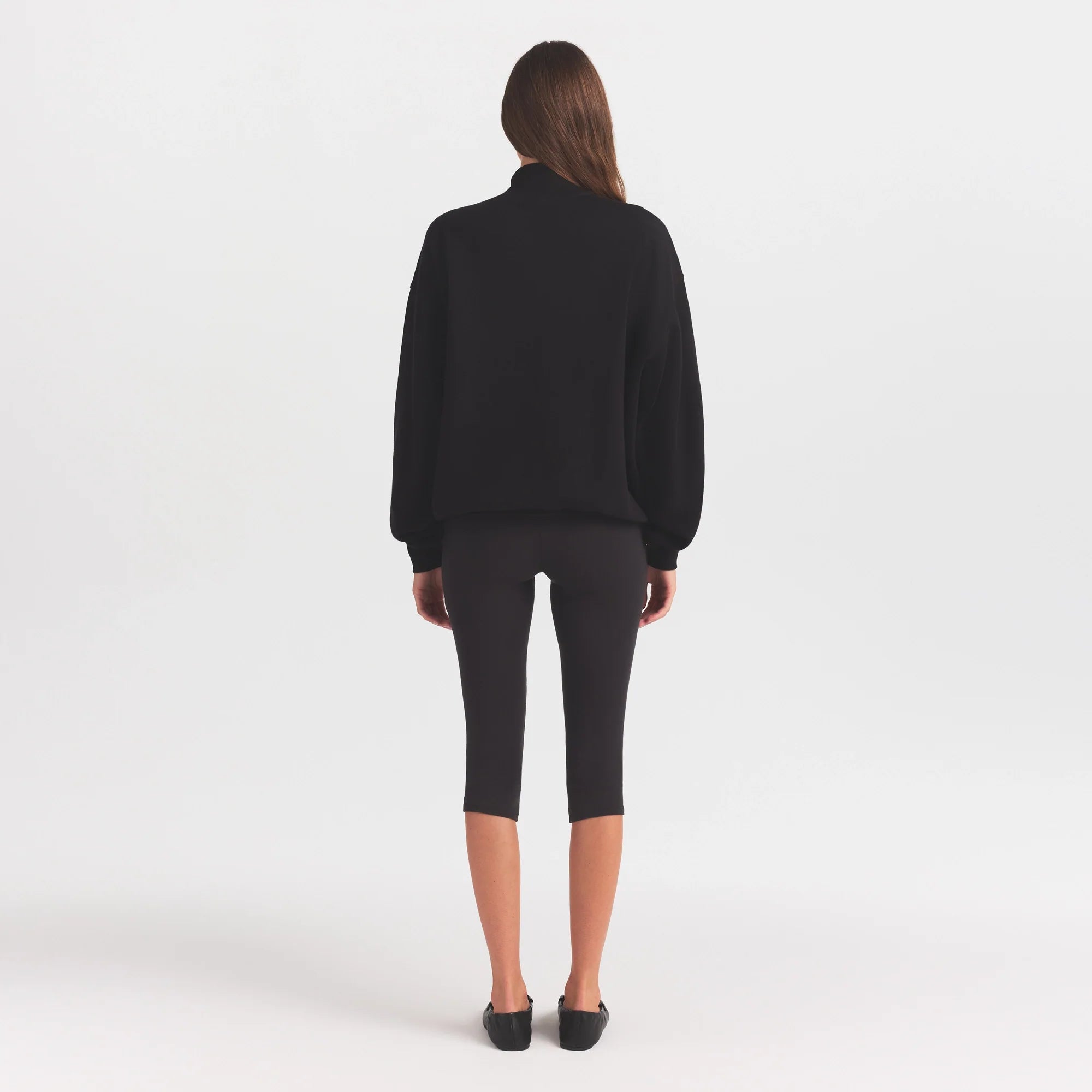 COTTON FLEECE MOCK NECK QUARTER ZIP WITH EMBOSSED LOGO | ONYX ON A MODEL FRONT VIEW @ | FOCUS: 0.0, 1.0, 0.9