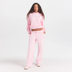 COTTON FLEECE HOODIE WITH EMBOSSED LOGO | CHERRY BLOSSOM ON A MODEL FRONT VIEW @ | FOCUS: 0.0, 1.0, 0.9