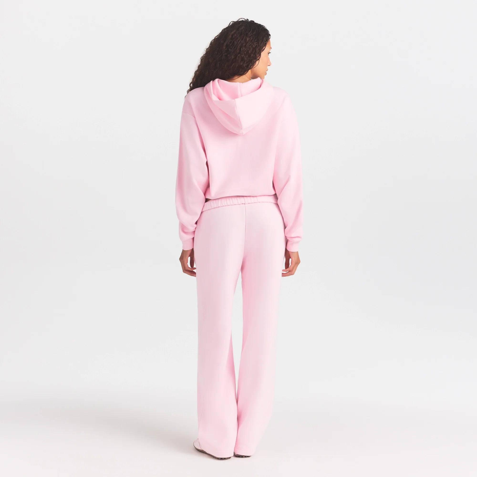 COTTON FLEECE HOODIE WITH EMBOSSED LOGO | CHERRY BLOSSOM ON A MODEL FRONT VIEW @ | FOCUS: 0.0, 1.0, 0.9