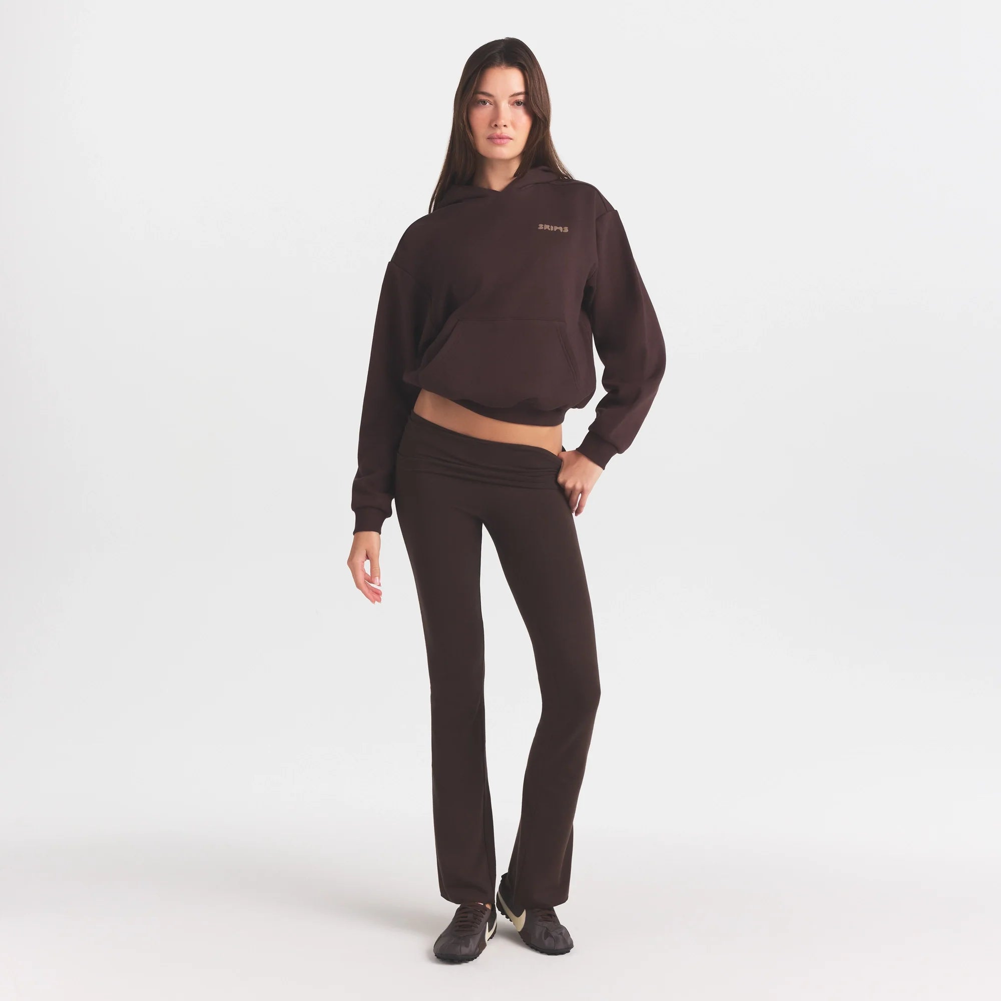 COTTON FLEECE HOODIE WITH EMBOSSED LOGO | ESPRESSO ON A MODEL FRONT VIEW @ | FOCUS: 0.0, 1.0, 0.9