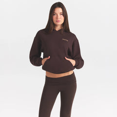 COTTON FLEECE HOODIE WITH EMBOSSED LOGO | ESPRESSO ON A MODEL SIDE VIEW @ | FOCUS: 0.0, 1.0, 0.9