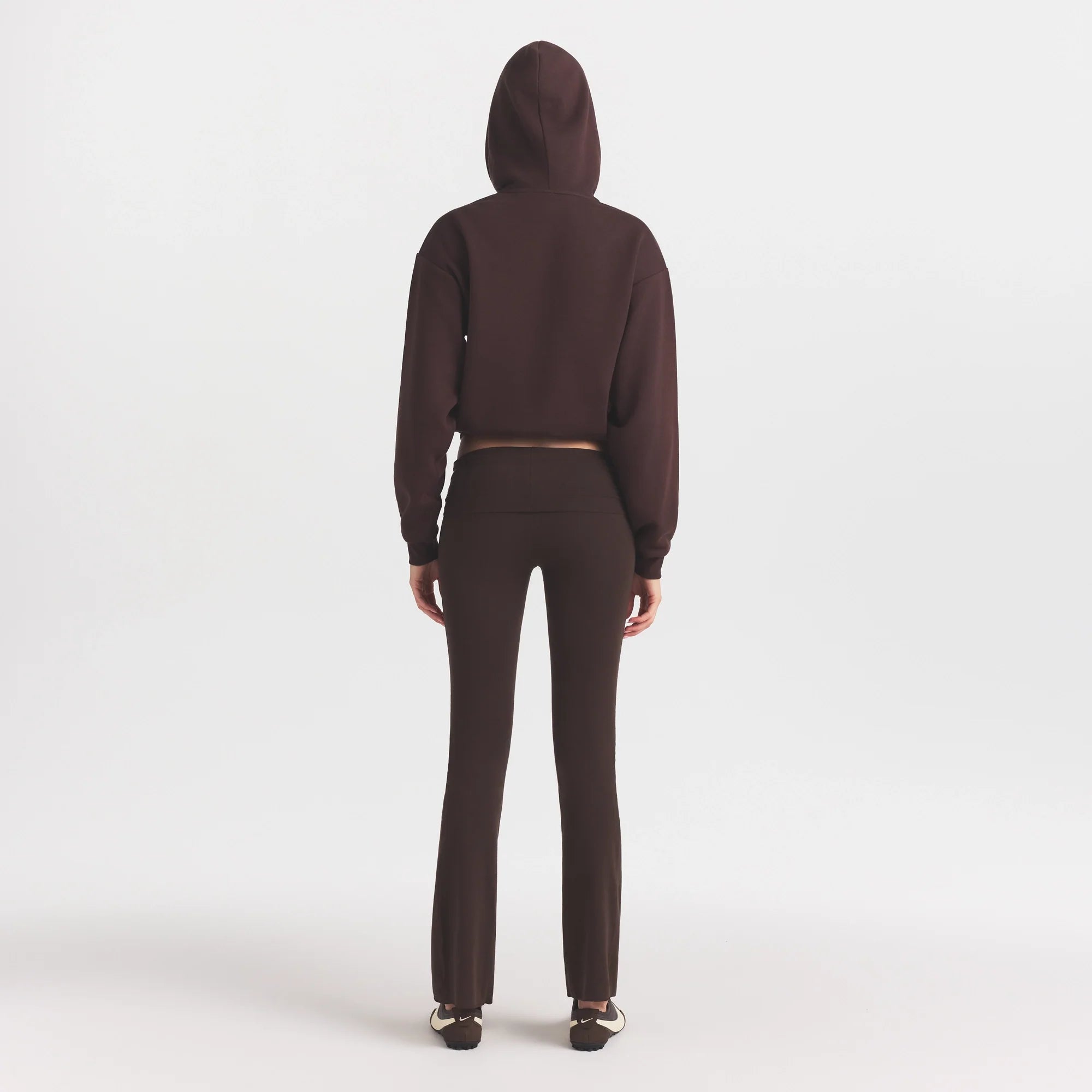 COTTON FLEECE HOODIE WITH EMBOSSED LOGO | ESPRESSO ON A MODEL FRONT VIEW @ | FOCUS: 0.0, 1.0, 0.9