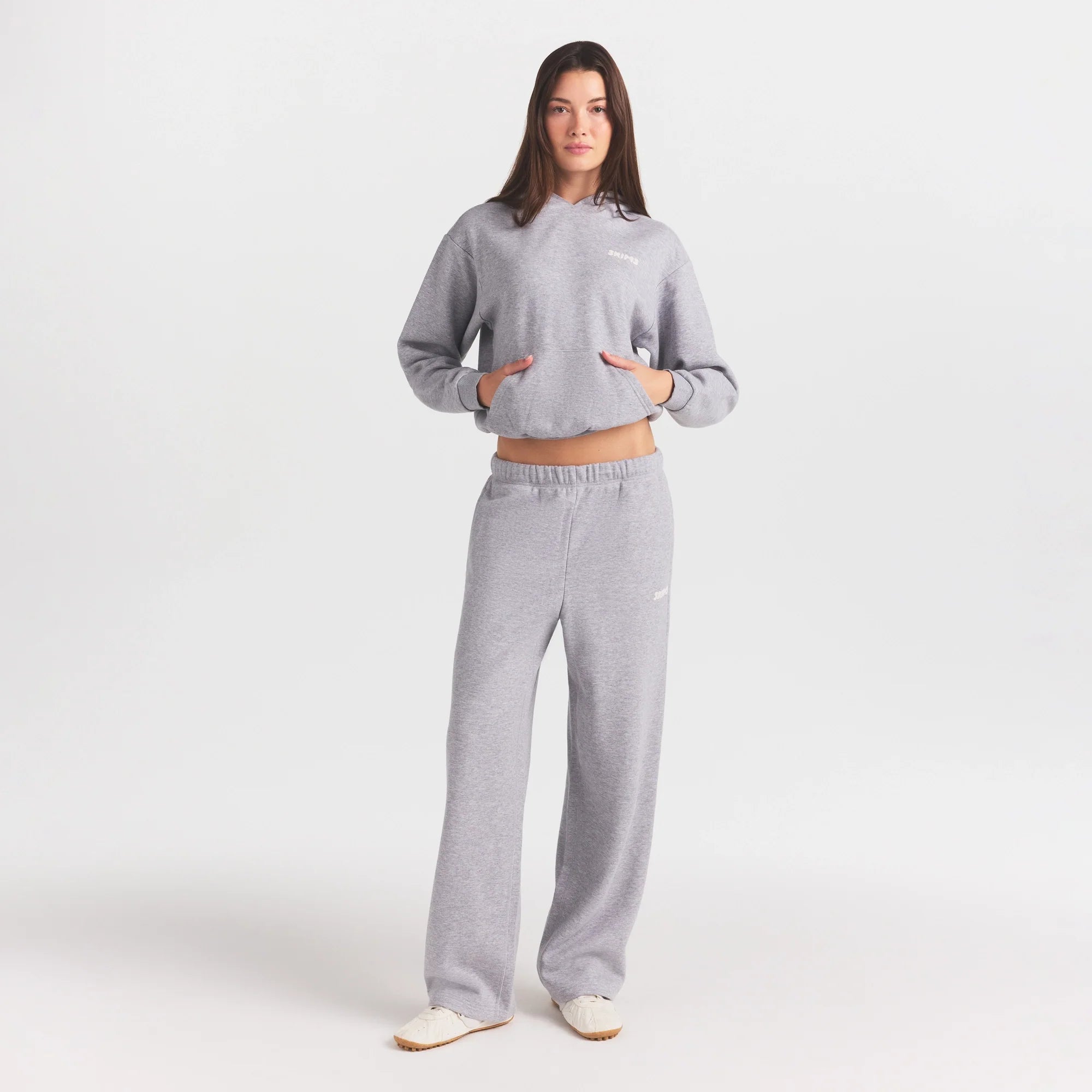 COTTON FLEECE CLASSIC HOODIE | HEATHER GREY ON A MODEL FRONT VIEW @ | FOCUS: 0.0, 1.0, 0.9